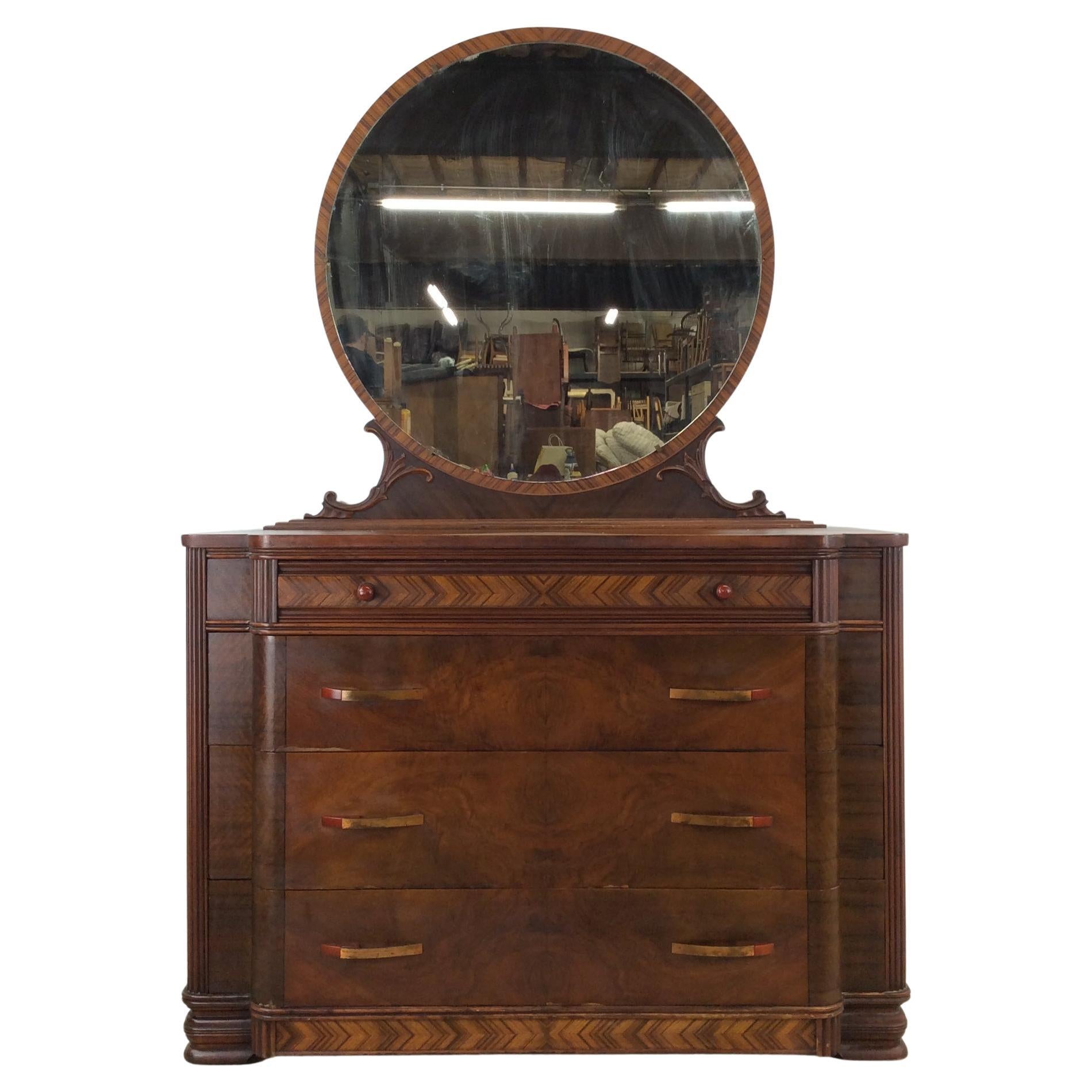 Antique Art Deco lowboy dresser with Bakelite pulls and mounted mirror For Sale