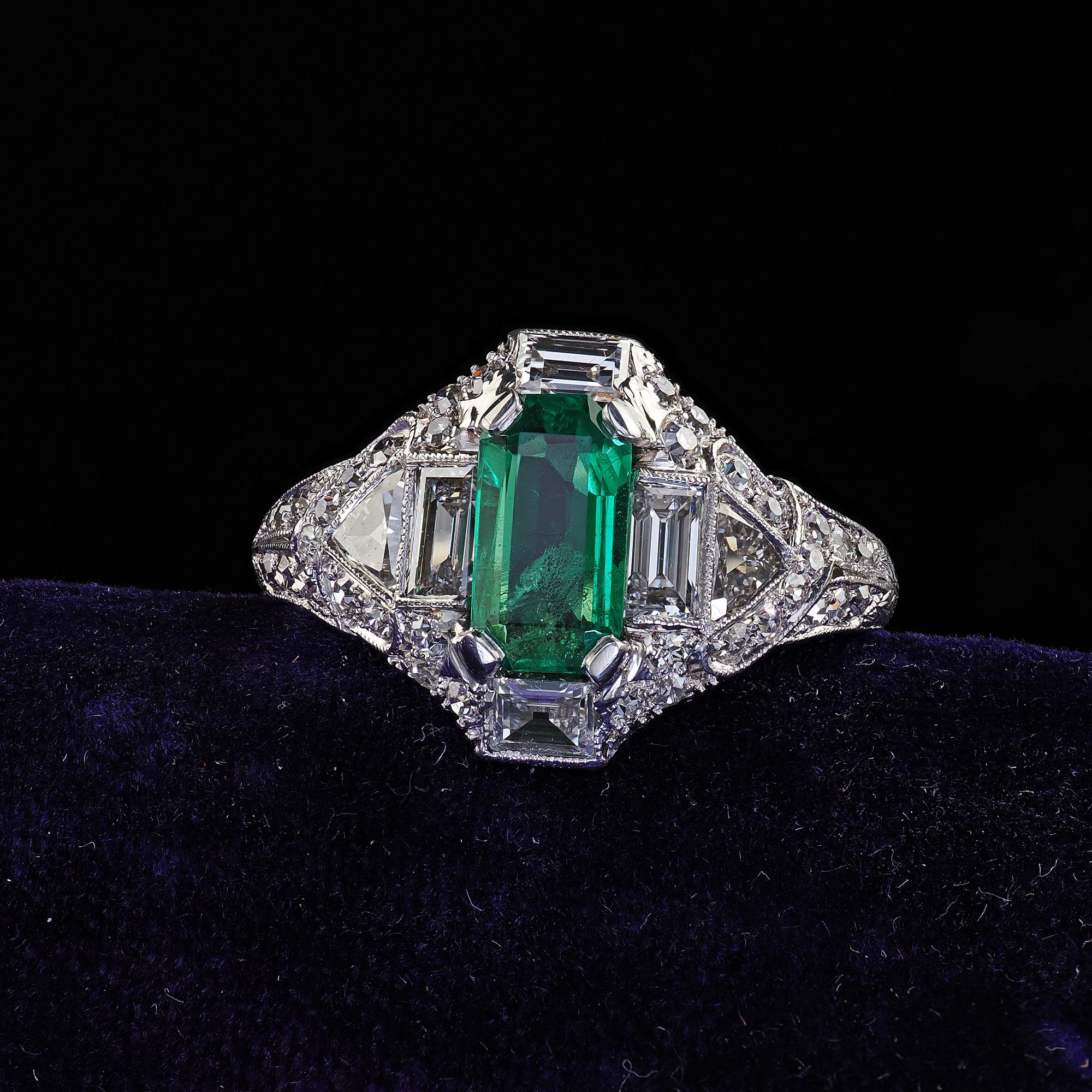 Beautiful Antique Art Deco Marcus Co Platinum Diamond No Oil Emerald Engagement Ring - GIA. This incredible Marcus and Co Art Deco emerald and diamond engagement ring is crafted in platinum. This gorgeous ring features a natural emerald in the