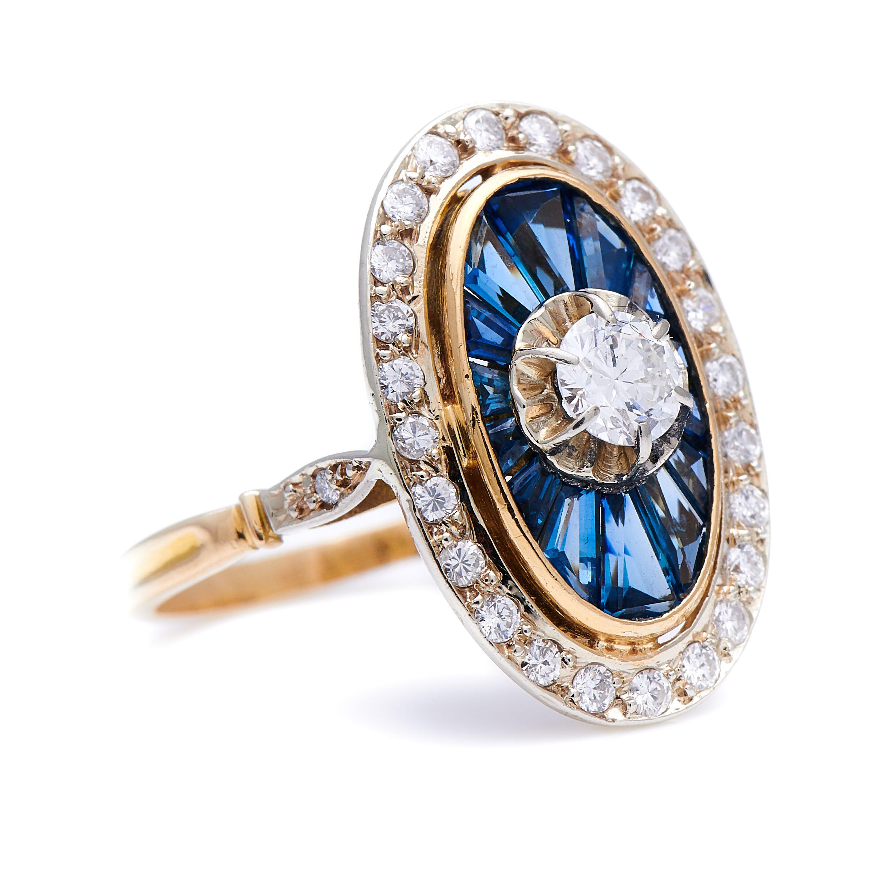Diamond and sapphire ring, 1930s. Of oval form, the centre claw-set with a brilliant-cut diamond weighing 0.35 carats, within a surround of radiating calibré-cut untreated natural sapphires, to an outer border of brilliant-cut diamonds. The