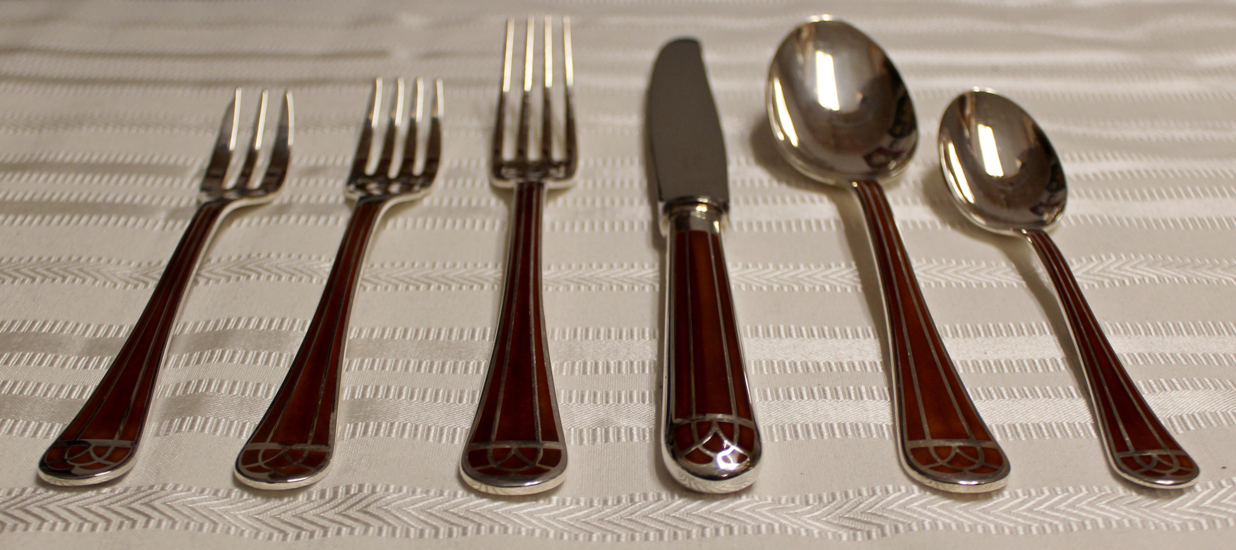 For your consideration is a magnificent set of inlaid flatware, 6 pc setting, service for 8, by Christofle, made in France, circa 1910s. In excellent condition. The knives are 9