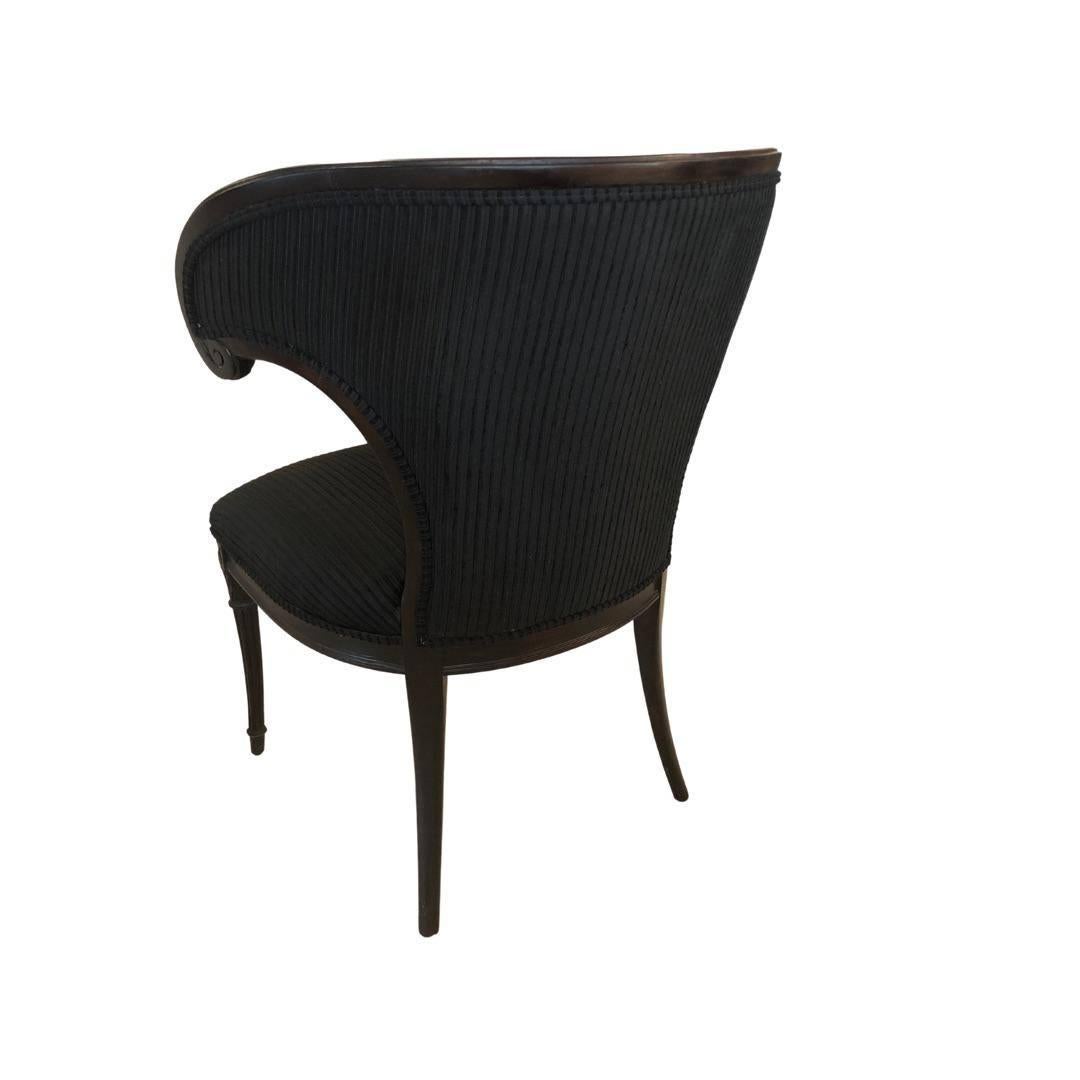 Architecturally stunning chairs. Completely refinished and reupholstered in a tone on tone black velvet. 70 years later, these chairs are still relevant and gorgeous. Solid wood and very sturdy.

Dimensions: 26ʺW × 24ʺD × 35ʺH
Styles: