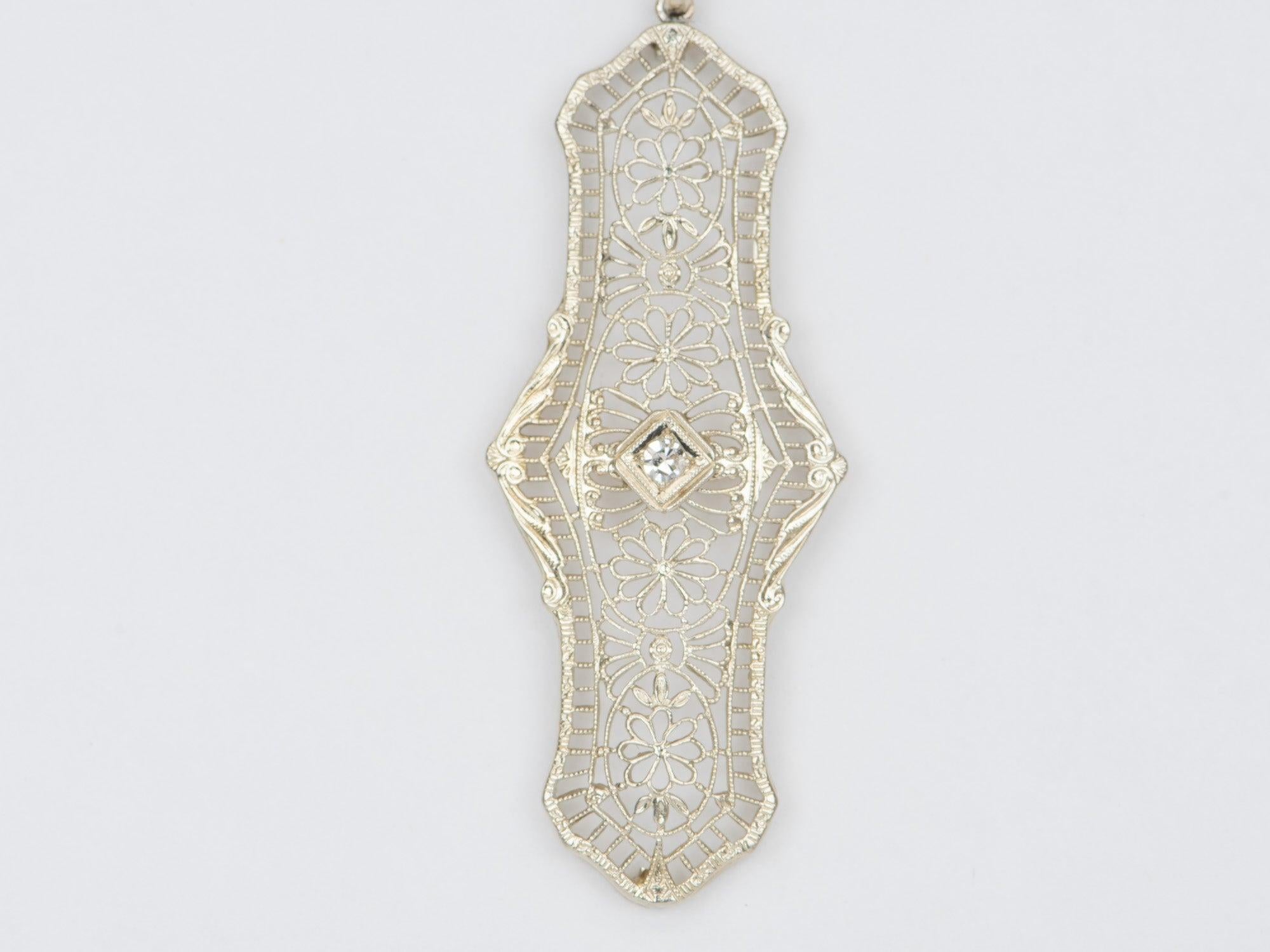 ♥ Solid 14K white gold vintage pin converted into a pendant
♥ Art-deco style with delicate filigrees in an elongated shape
♥ This measures 47.7mm in length, 19.6mm in width, and 4.5mm thick


♥ Material: Genuine 14K gold
♥ Gemstone: Natural