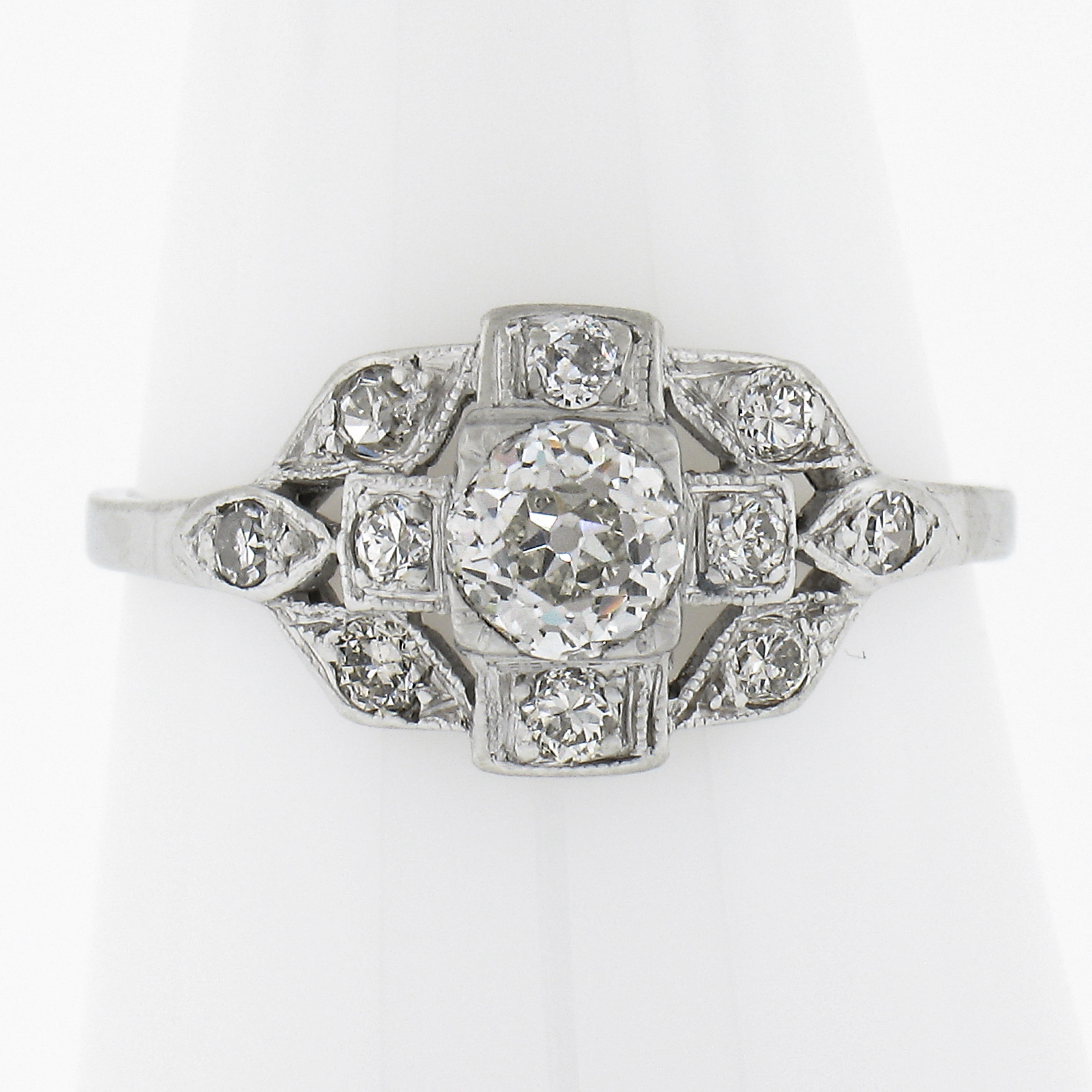 --Stone(s):--
(1) Natural Genuine Diamond - Old European Cut - Prong Set - J Color - SI1 Clarity - 0.50ct (exact - certified)
* See Certification Details Below*
(10) Natural Genuine Diamonds - Old Single & Old European Cut - Pave Set - G-I Color -
