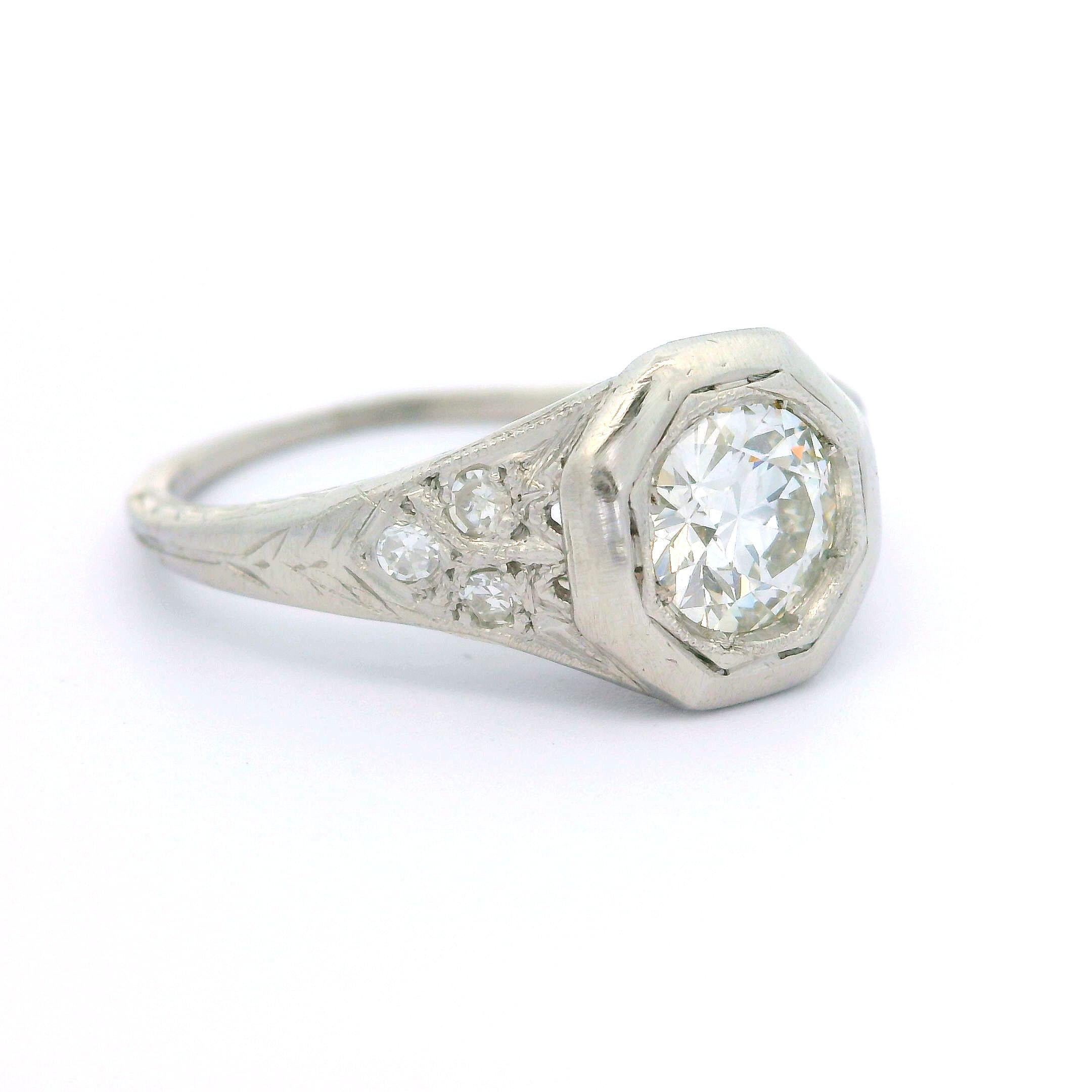 --Stone(s):--
(1) Natural Genuine Diamond - Old European Cut - Pave Set Bezel Style - G Color - SI1 Clarity - 0.61ct (approx.)
(6) Natural Genuine Diamonds - Old Single Cut - Pave Set - 0.12ctw (approx.)
Total Carat Weight: 0.73 (approx.)

Material: