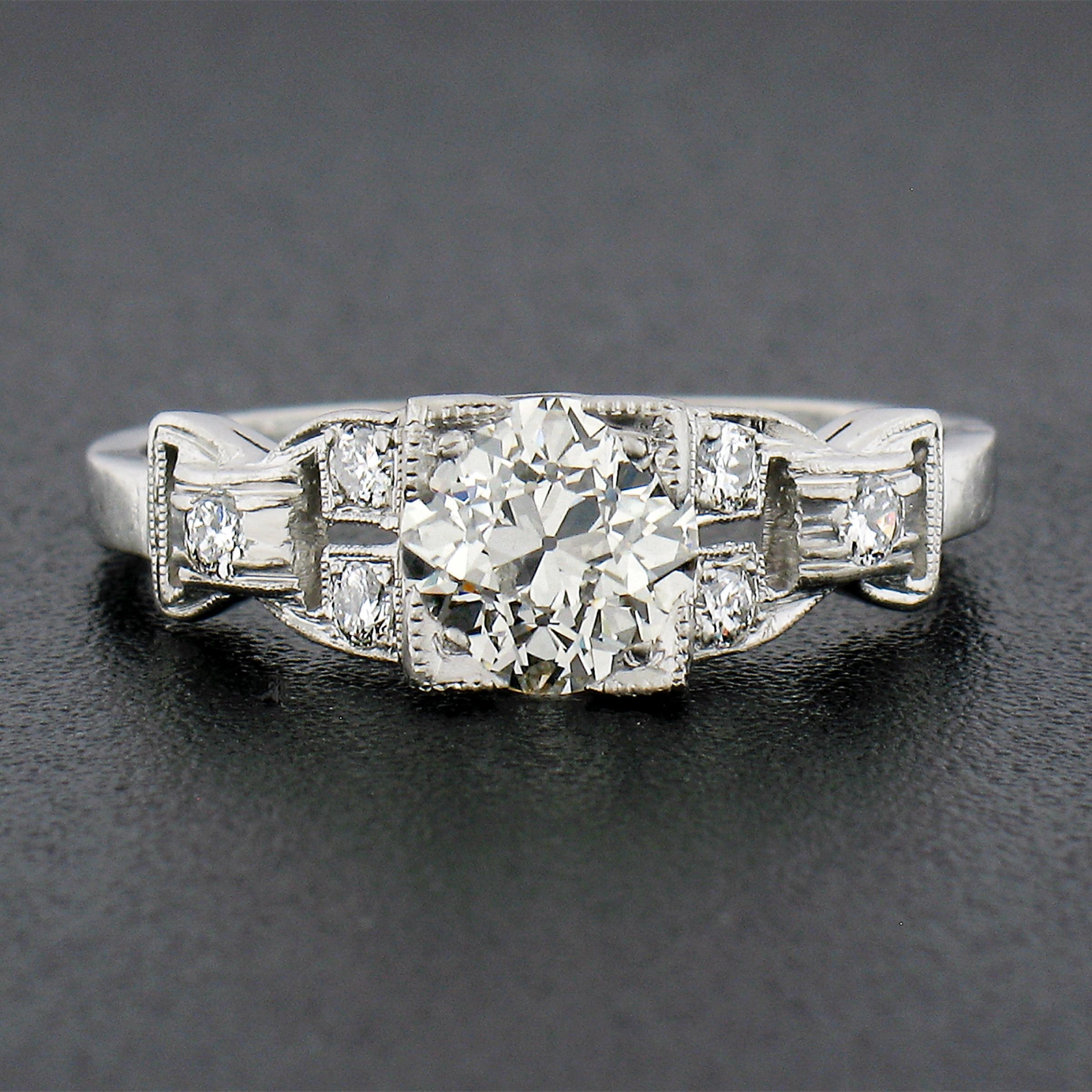 Taille vieille Europe Bague Art déco ancienne style boucle latérale en platine avec diamants européens 0,92 carat en vente