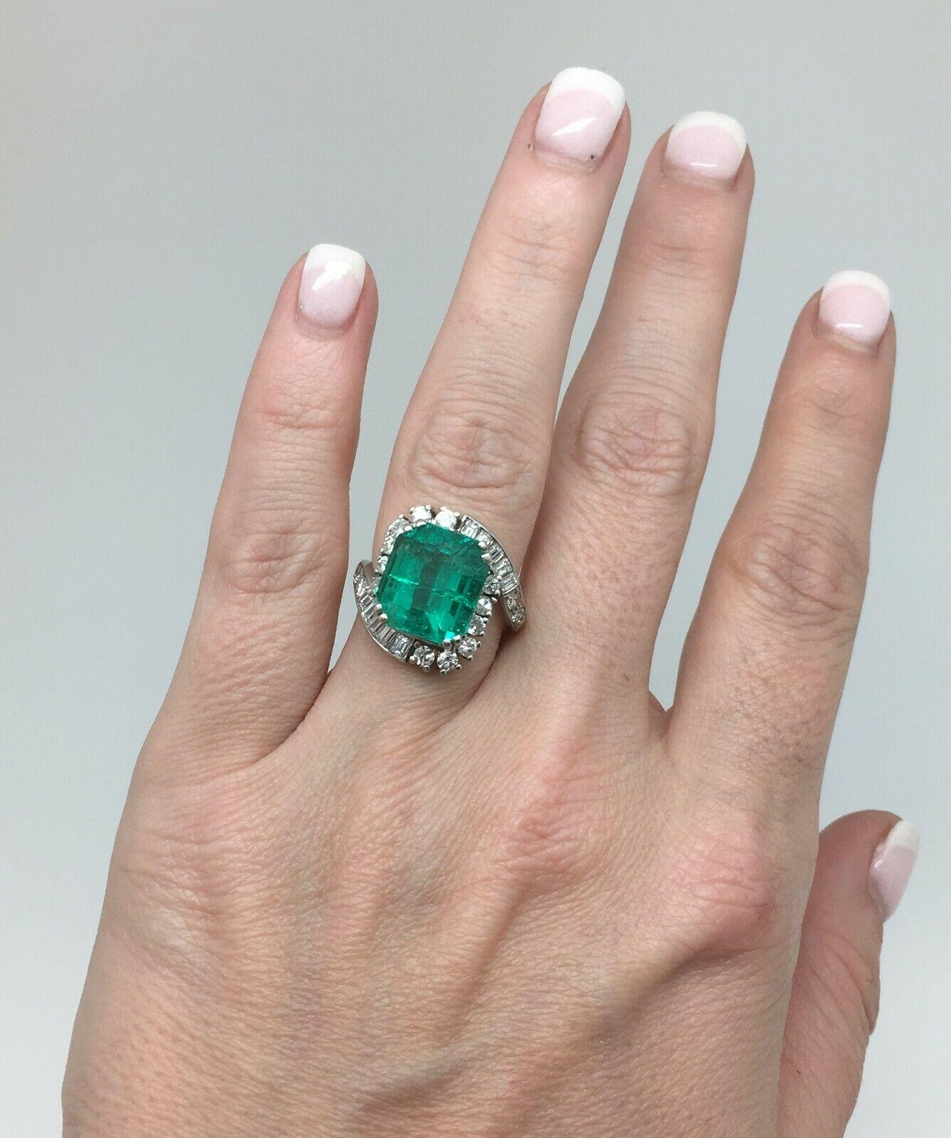 Art Deco Platinum 10.20 Carat Total Weight Colombian Emerald Diamond Engagement Ring


One Natural Colombian Emerald, Measuring 18.20 x 10.50 x 7.20mm, Weighing Approximately 9.40 Carats.

The Mounting Contains 16 Round Old Single Cut Diamonds And