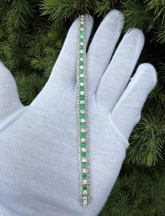 Pulsera antigua Art Decó de platino con esmeralda colombiana de 12,35 ctw y diamantes talla antigua