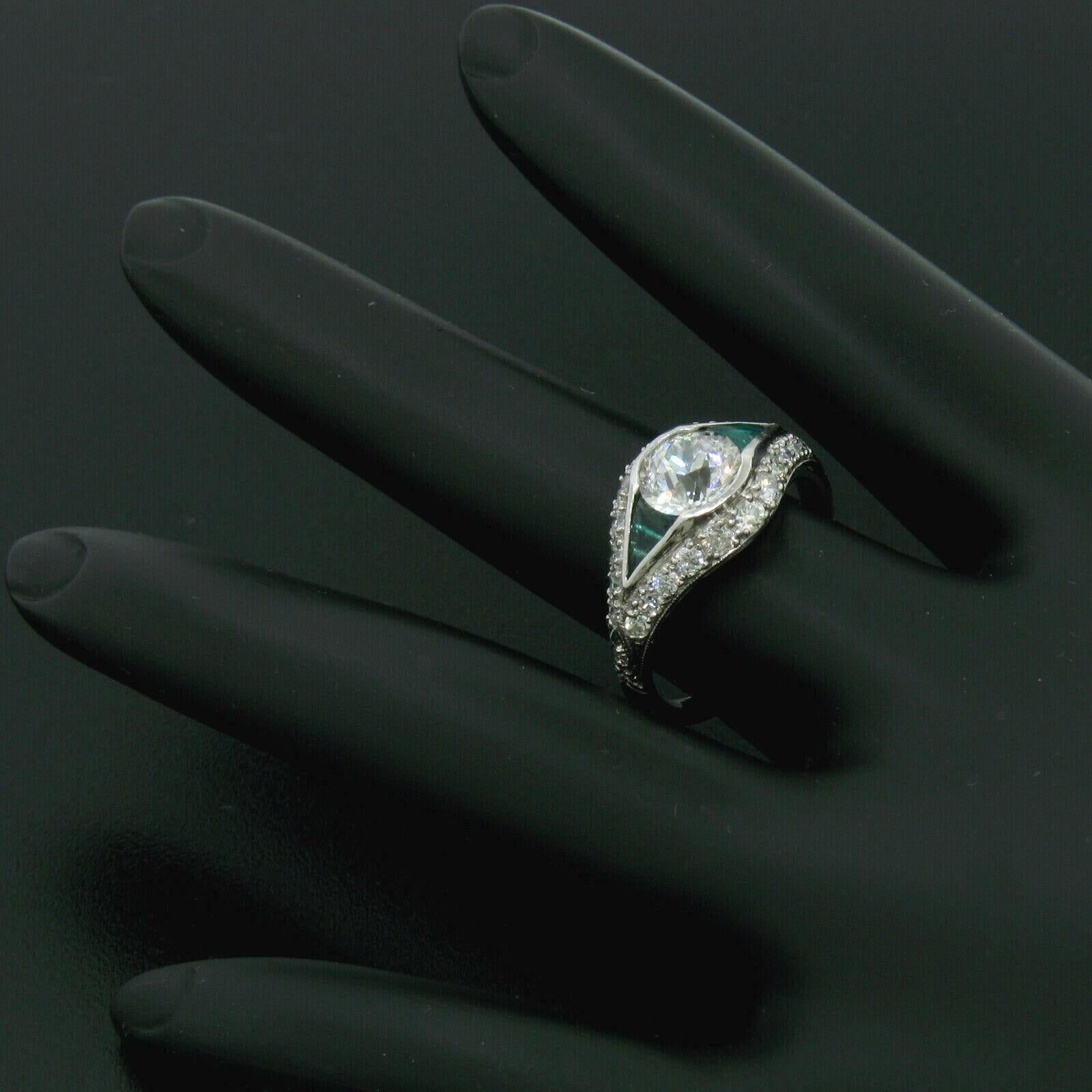 Old European Cut Antique Art Deco Platinum 1.65 Carat Old European Diamond and Emerald Ring