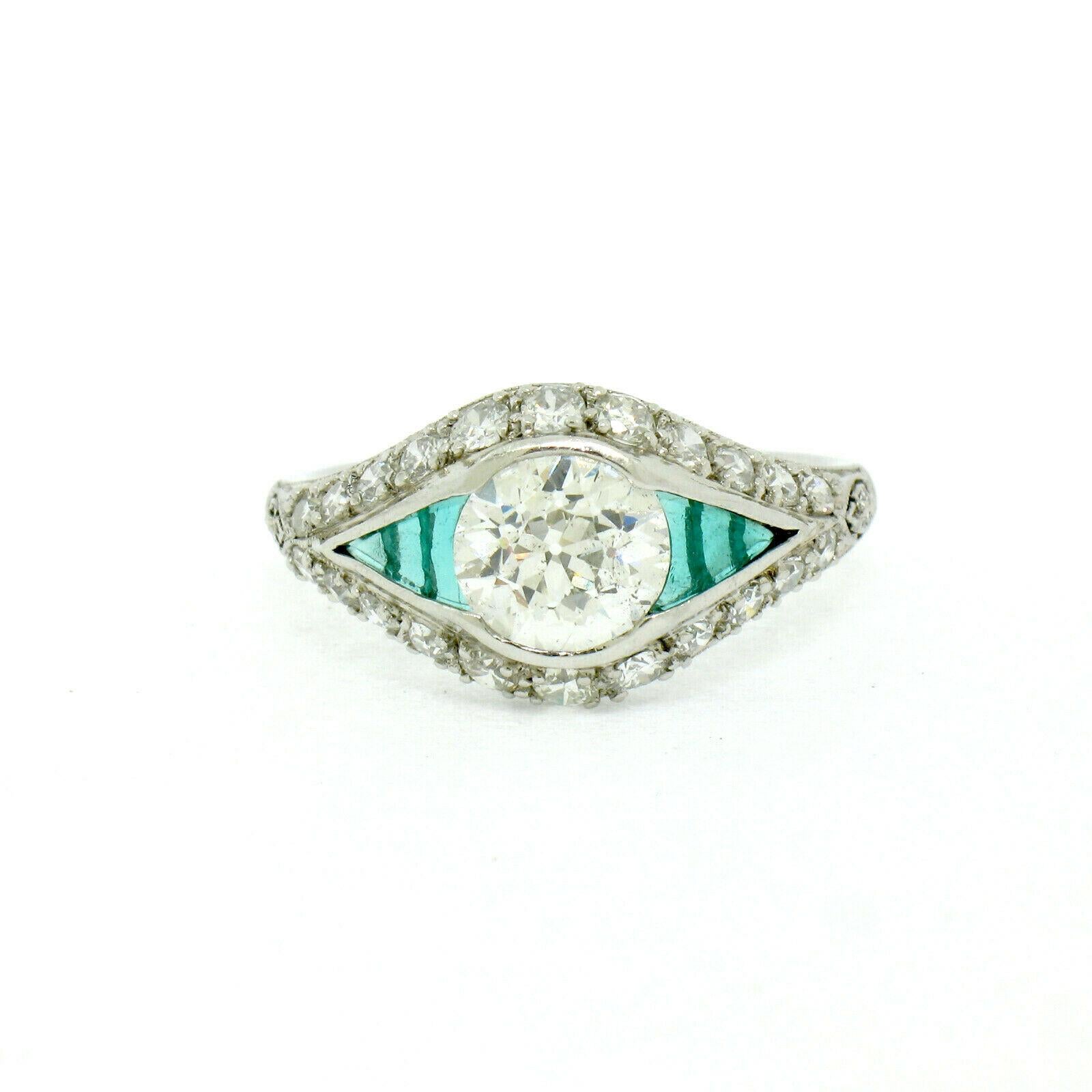 Women's Antique Art Deco Platinum 1.65 Carat Old European Diamond and Emerald Ring