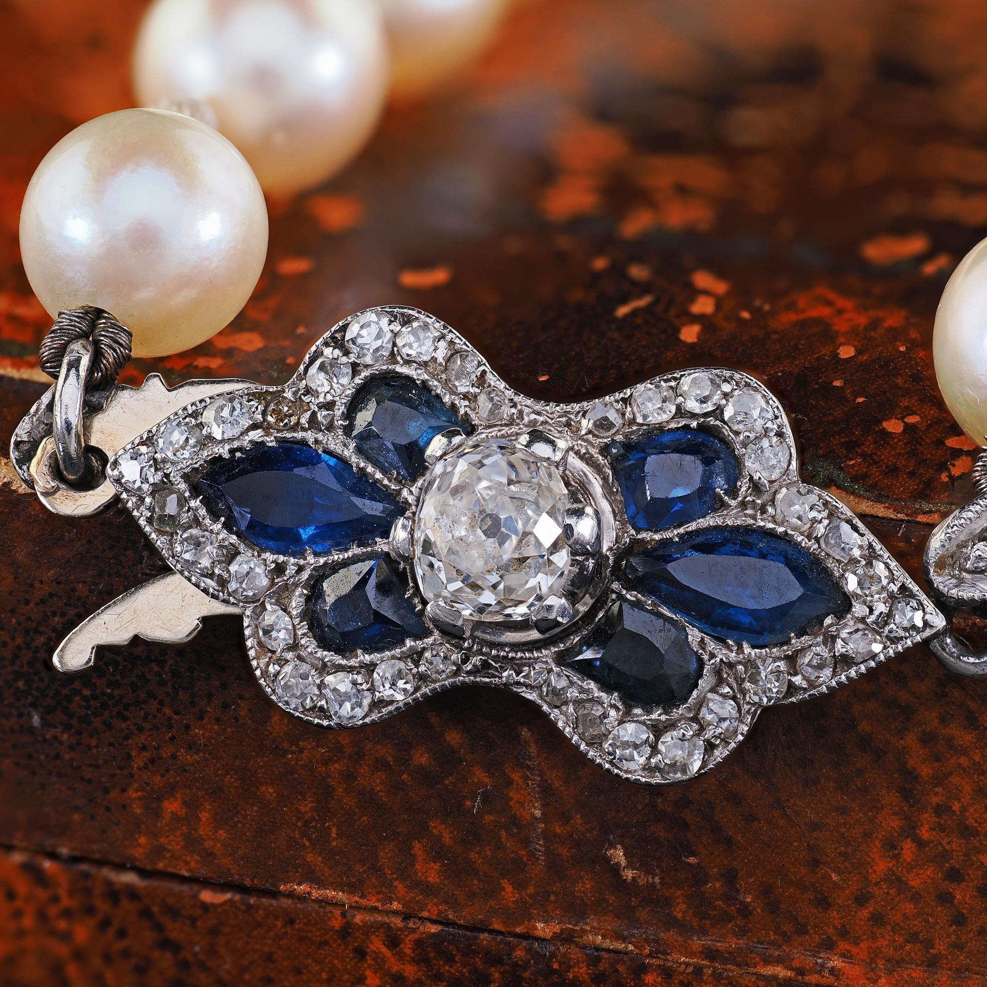 Art Déco Collana antica Art Deco in platino e oro 18 carati con diamanti Old Mine e zaffiri e perle in vendita