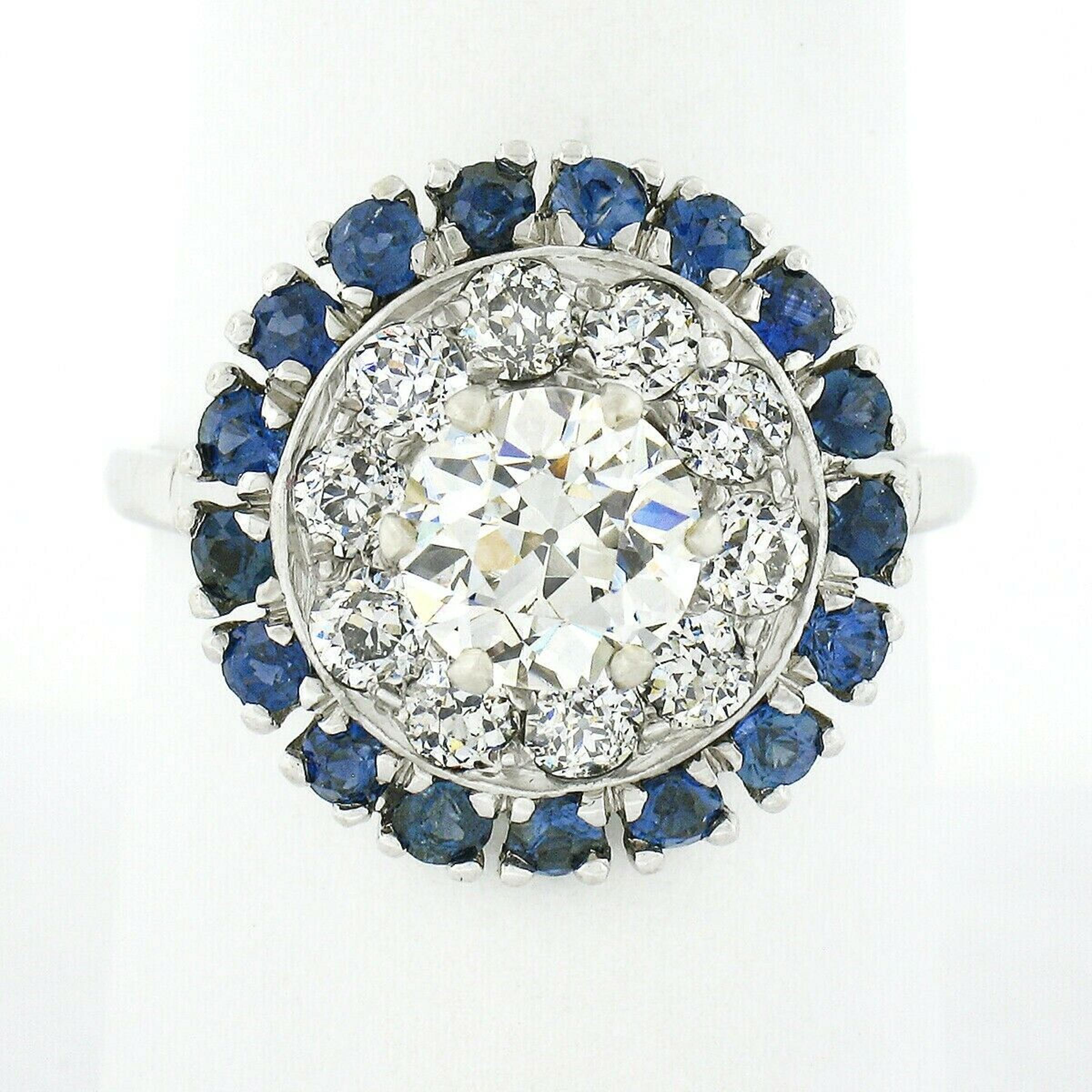 Nous avons ici une bague de fiançailles ou de cocktail en diamant absolument magnifique et ancienne, fabriquée en platine massif pendant la période art déco. Elle est ornée d'un époustouflant diamant solitaire de taille européenne ancienne, certifié