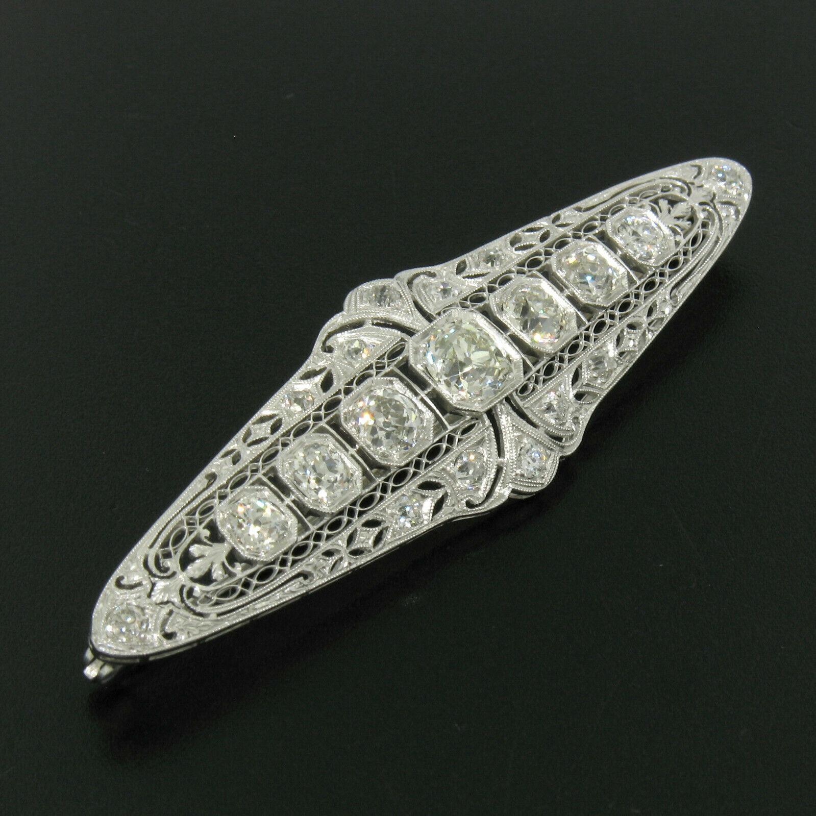Women's or Men's Art Deco Platinum 6.0 Carat Old Euro and Mine Cut Diamond Filigree Brooch Pin For Sale