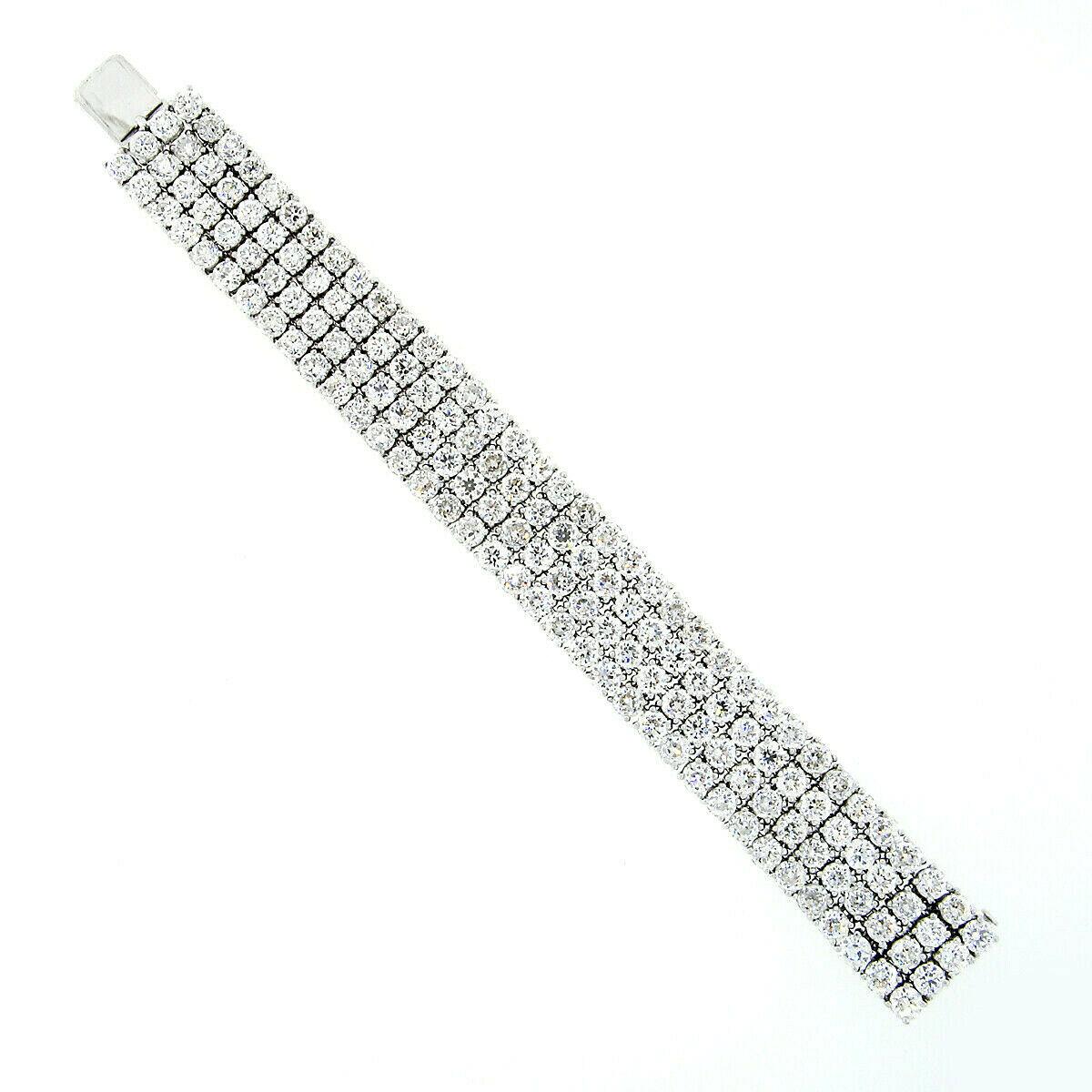 Art Deco Platinum 64.80 Carat Old European Cut Diamond 4-Row Tennis Bracelet In Excellent Condition In Montclair, NJ