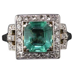 Antique Art Deco Platinum and 18 Karat Gold Diamond and Emerald Cocktail Ring
