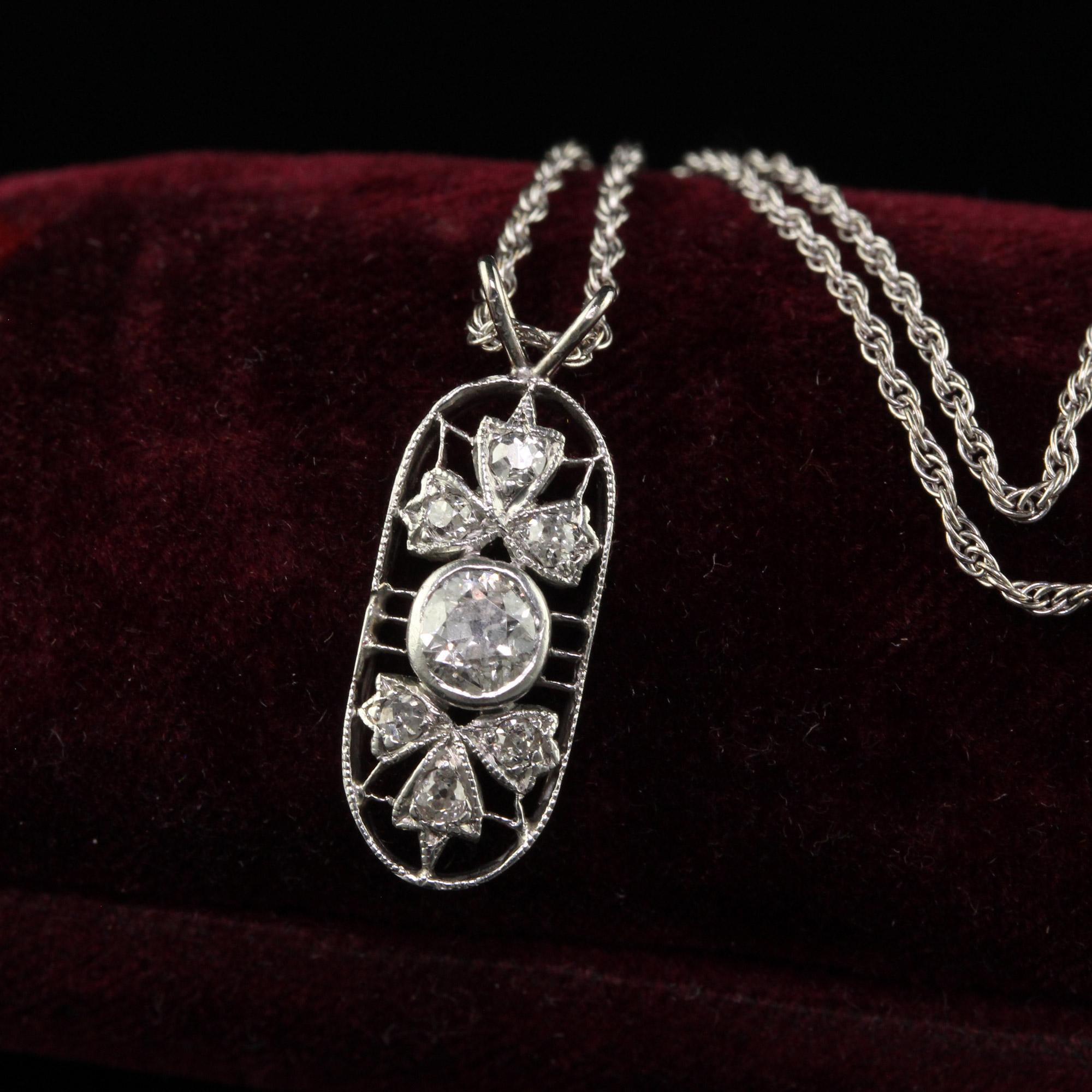 Antique Art Deco Platinum and White Gold Old Mine Diamond Filigree Pendant In Good Condition In Great Neck, NY