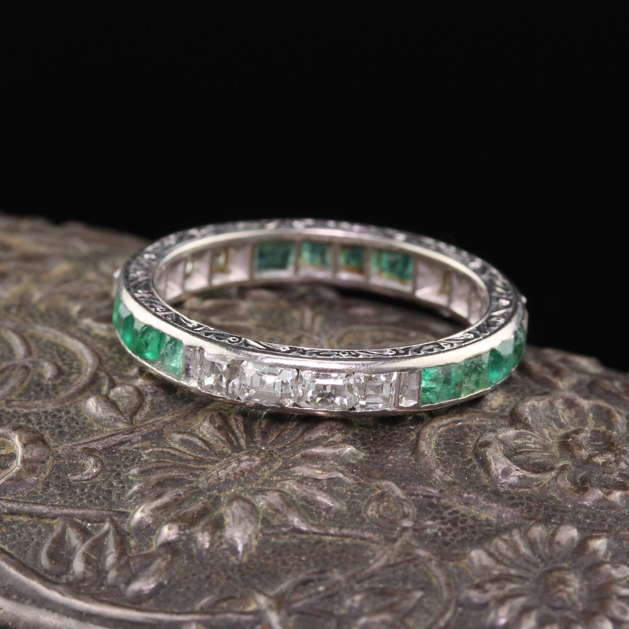 Art Deco Platinum Eternity Band with emeralds, asscher cut diamonds, and crisp engravings on both sides. The emeralds are abraded from almost 100 years of wear, but the ring is in overall great condition for it's age!

#R0157

Metal:
