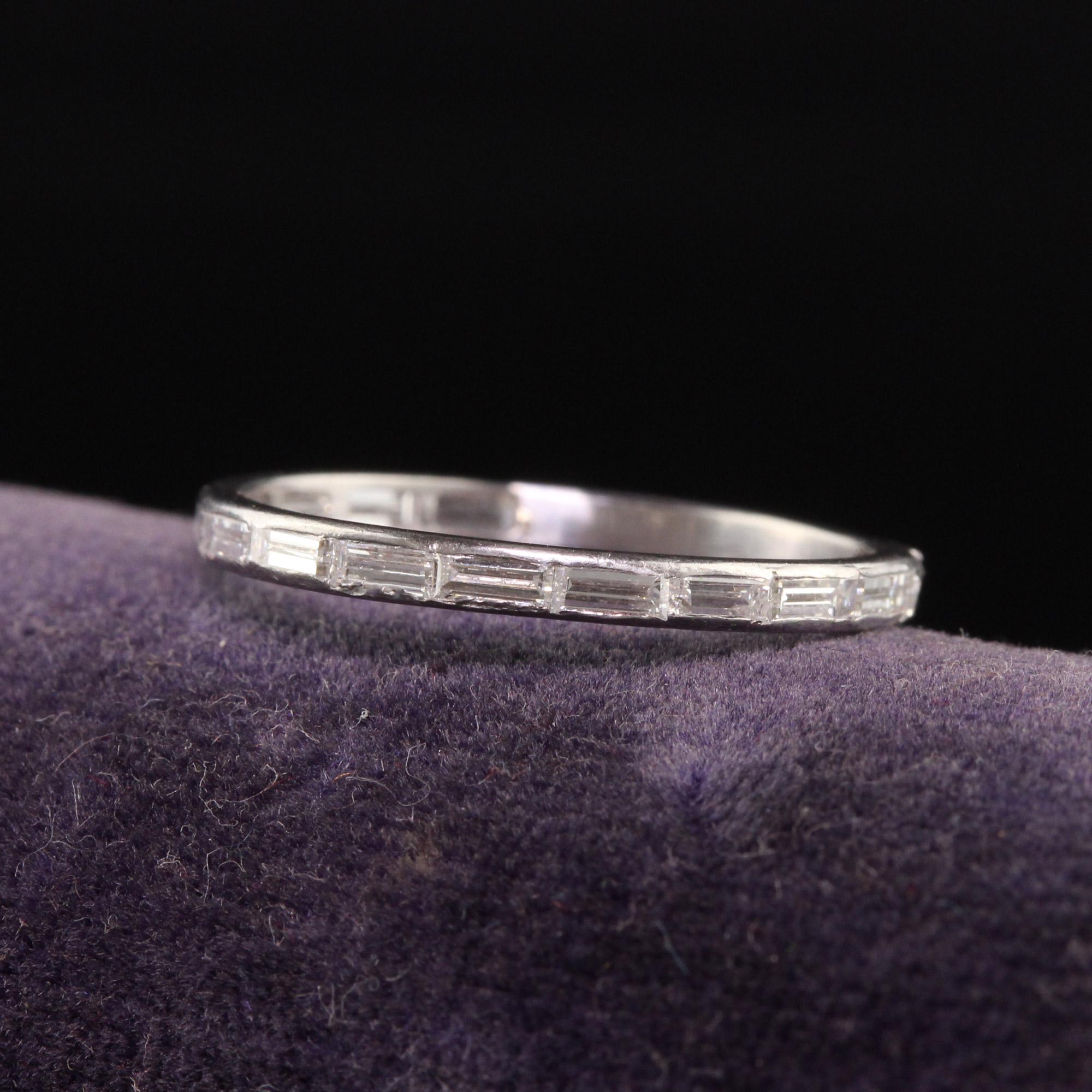 Beautiful Antique Art Deco Platinum Baguette Diamond Wedding Band. This beautiful band is crafted in platinum. This band was previously sized and had a portion of the band replaced with plain platinum. It is a gorgeous band with beautifully white