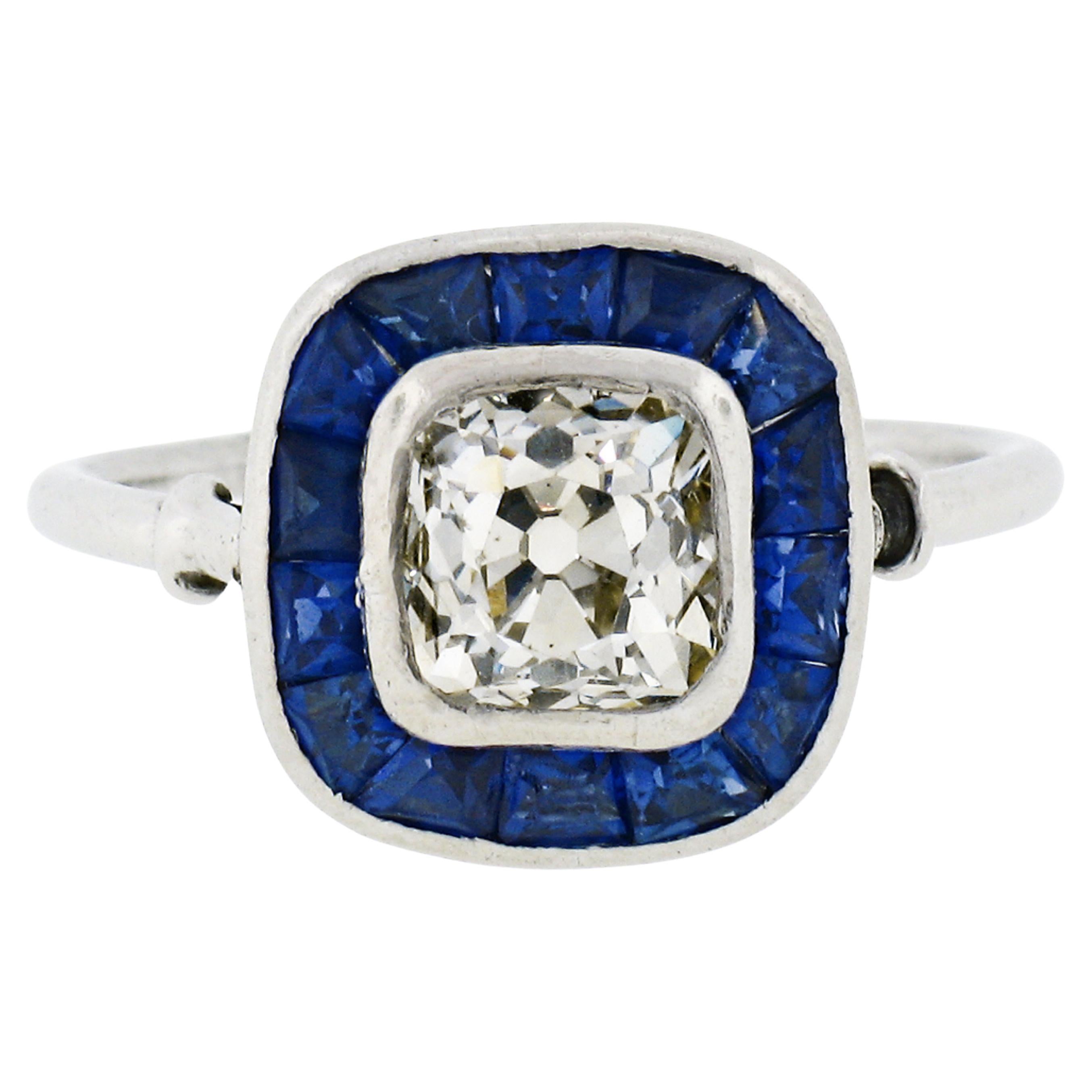 Antique Art Deco Platinum Bezel Old Mine Cushion Diamond & Sapphire Halo Ring For Sale