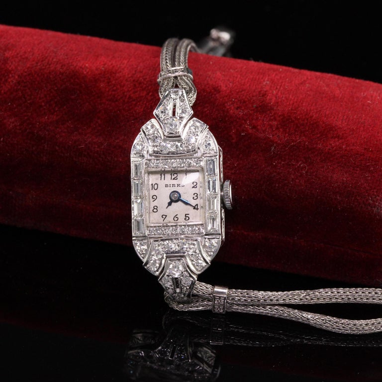Beautiful Antique Art Deco Platinum Birks Baguette Diamond Ladies Dress Watch. This gorgeous ladies dress watch is manufactured by Birks and is in great condition. It has old cut baguettes and single cut diamonds on it and the case is beautifully