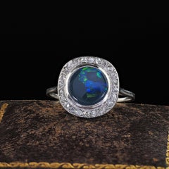 Antique Art Deco Platinum Black Opal and Old Cut Diamond Engagement Ring