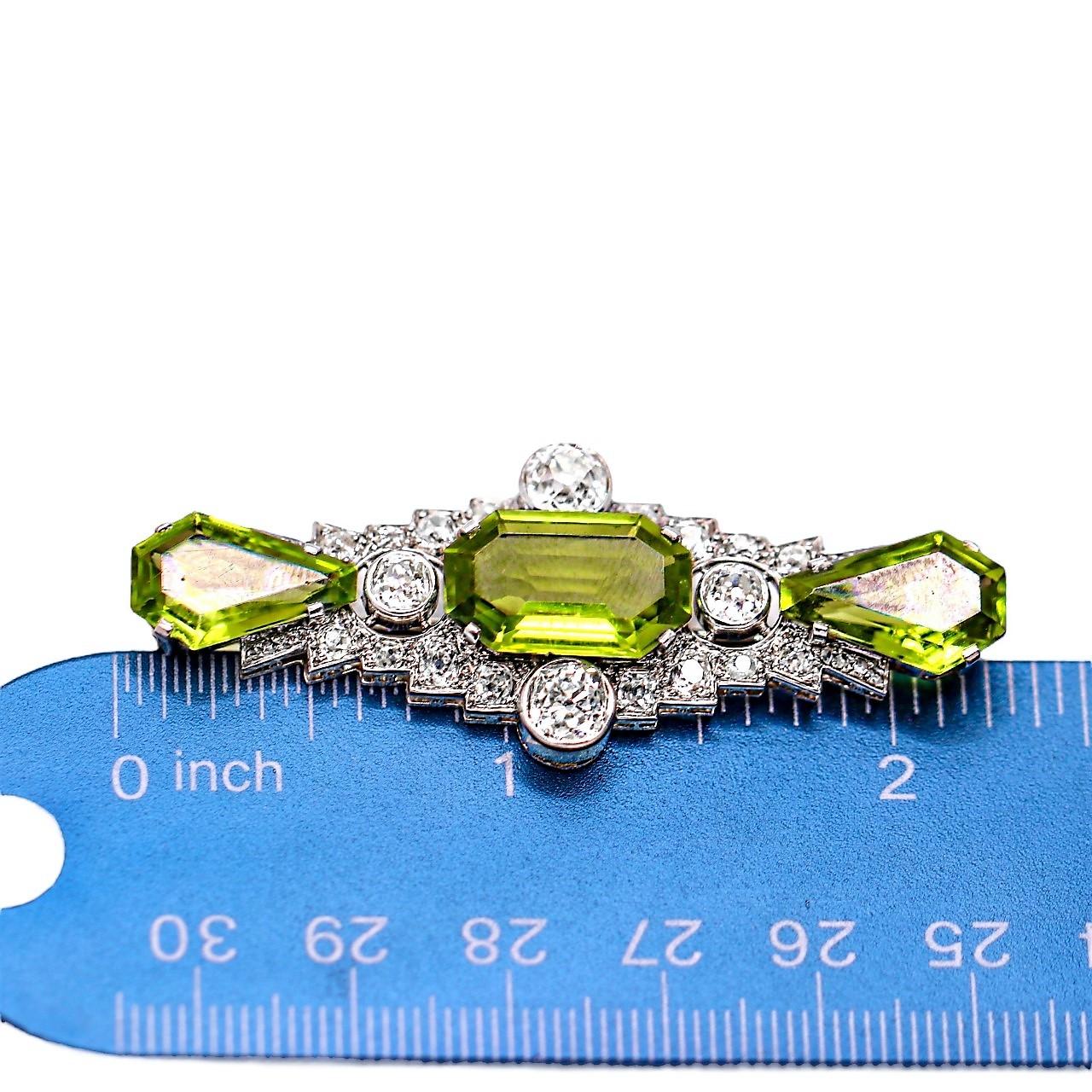 Emerald Cut Antique Art Deco Platinum Brooch with Diamonds and Peridot For Sale