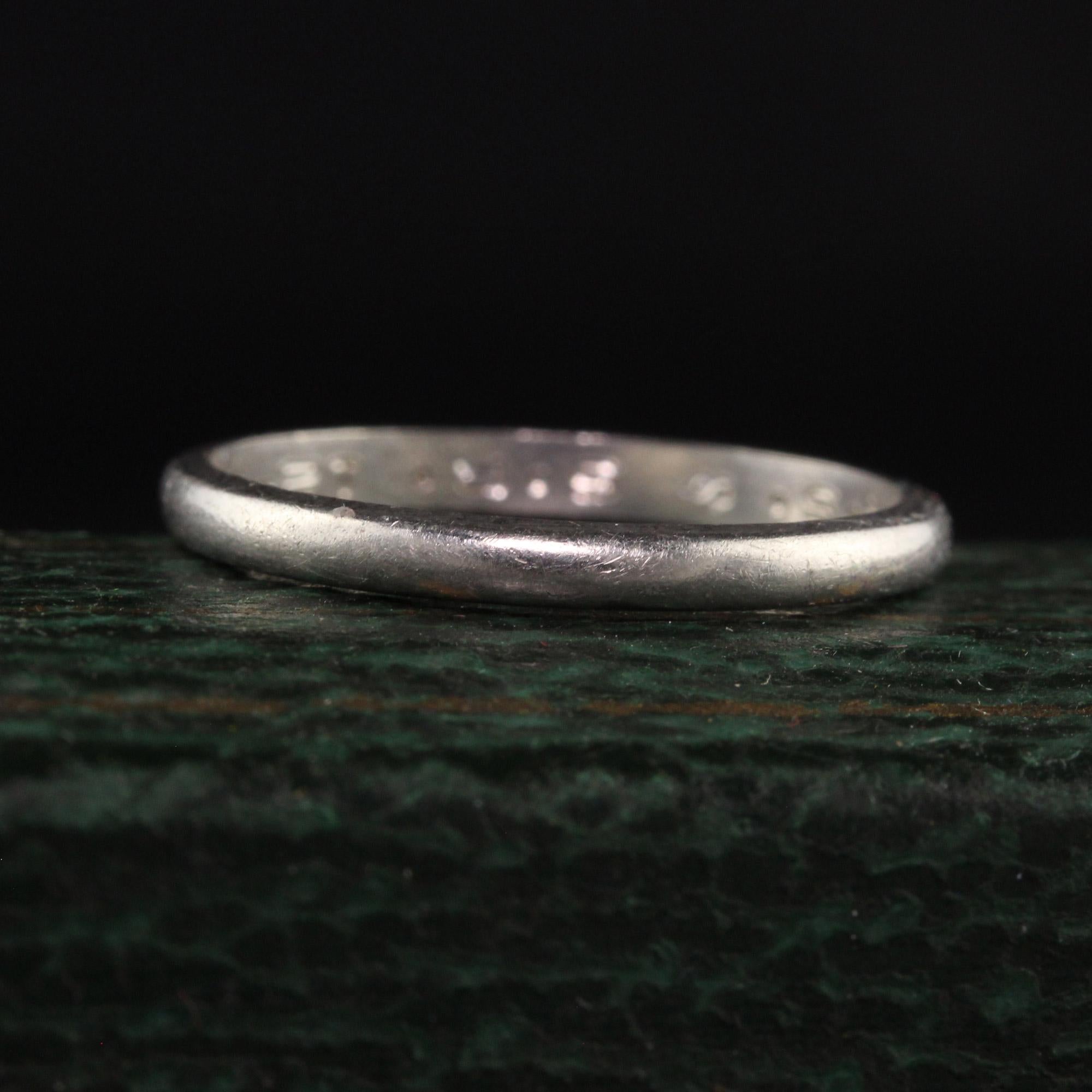 Beautiful Antique Art Deco Platinum Classic Plain Engraved Wedding Band. This classic wedding band is crafted in platinum. The inside of the ring is engraved 