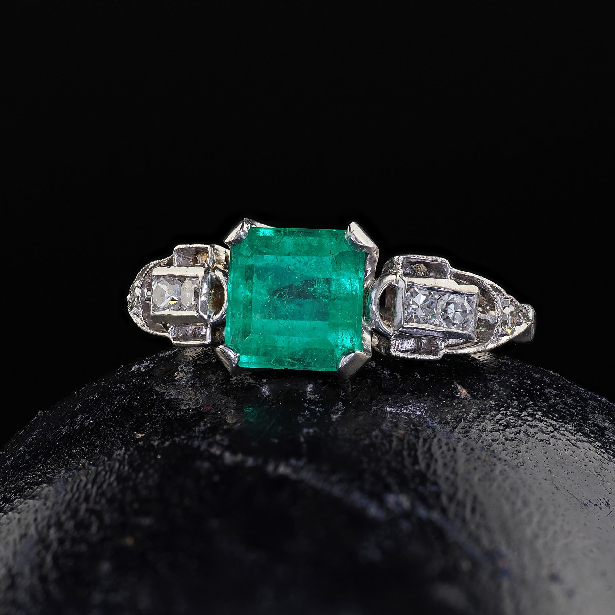 Beautiful Antique Art Deco Platinum Colombian Emerald and Diamond Engagement Ring - GIA. This gorgeous Art Deco Colombian emerald and diamond engagement ring is crafted in platinum. This ring features a natural Colombian emerald in the center that