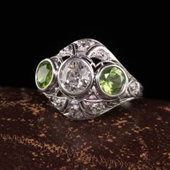 Antique Art Deco Platinum Demantoid Garnet and Diamond Three Stone Ring