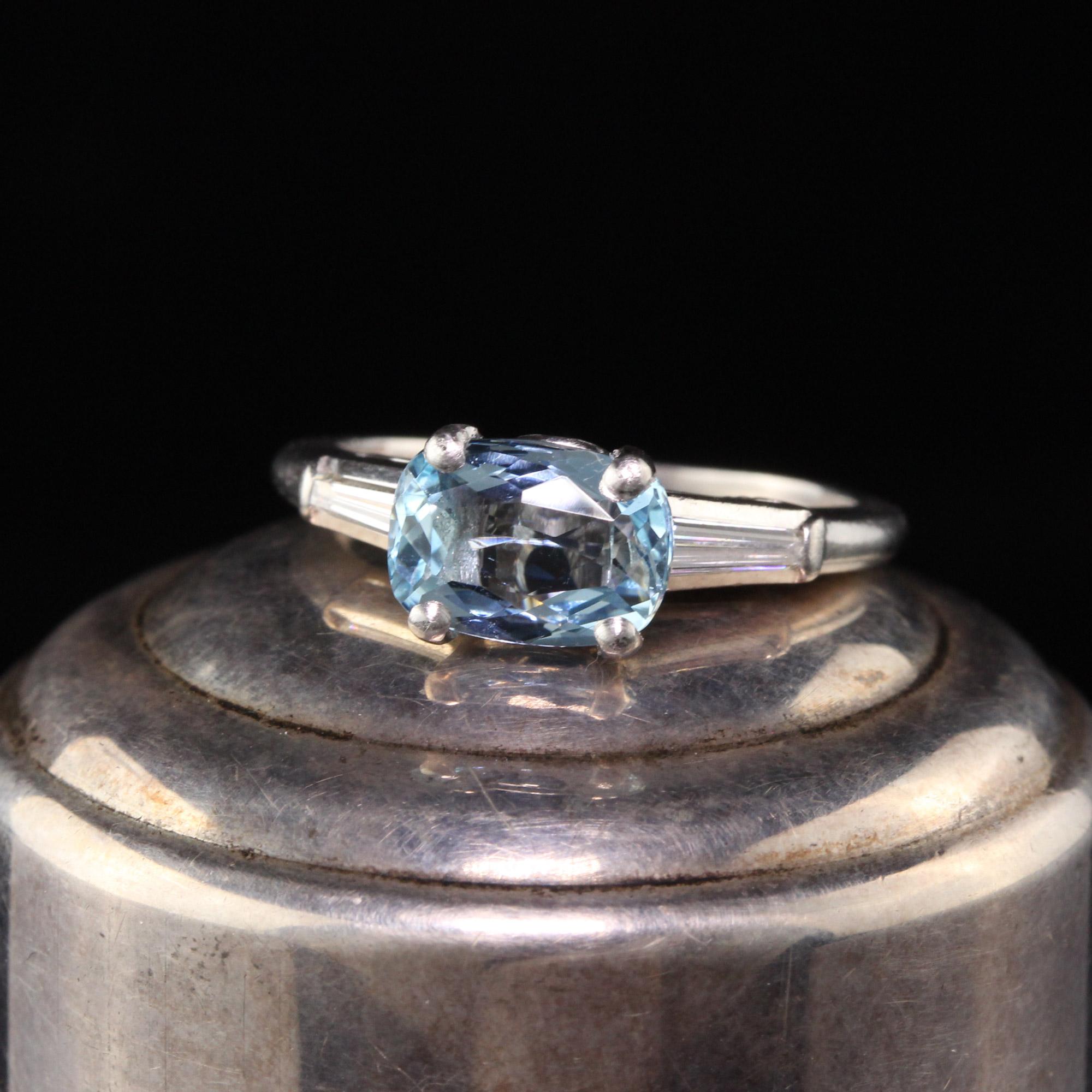 Gorgeous Antique Art Deco Platinum Diamond and Aquamarine Engagement Ring. This beautiful ring has a 1.30 ct aquamarine in the center flanked by two tapered baguettes weighing .40 ct total. 

Item #R0708

Metal: Platinum

Weight: 4.2 Grams

Total