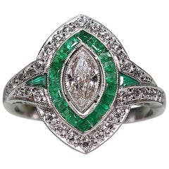 Antique Art Deco Platinum Diamond and Emerald Ring