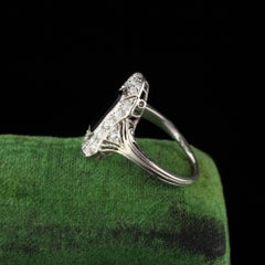 Antique Art Deco Platinum Diamond and Onyx Engagement Ring