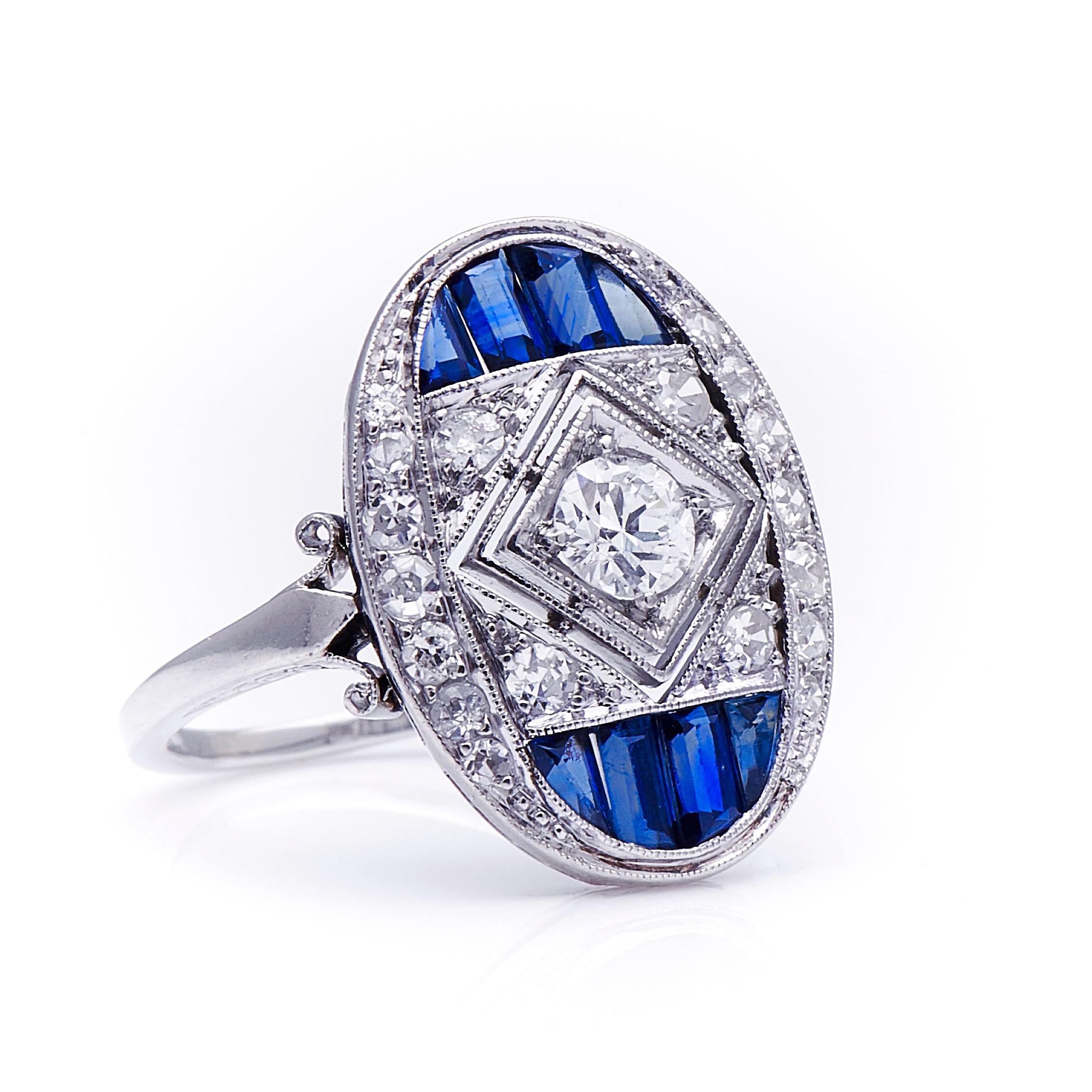 Sapphire and diamond ring, 1920s. This oval ring is packed with intricate detail. From its millegrain-bordered setting of circular- and single-cut diamonds, to its painstakingly cut calibré-cut natural sapphires and intricately hand-sawn metalwork,