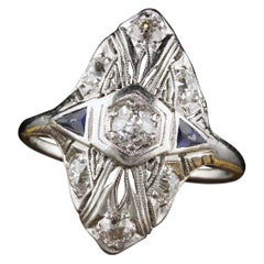 antique shield ring Antique Art Deco Platinum Diamond and Sapphire Shield Ring