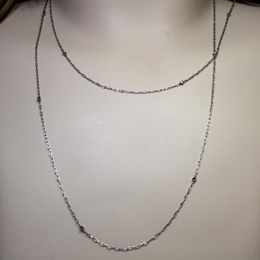 Period: Art deco (1920-1935)
Composition: Platinum.
Stones:
•	12 Old mine cut diamonds of H-VS2 quality that weigh 1.20ctw.
Chain Measures: 1m. long
Total weight: 6grams – 3.9dwt 
This purchase comes with a professional appraisal document for the