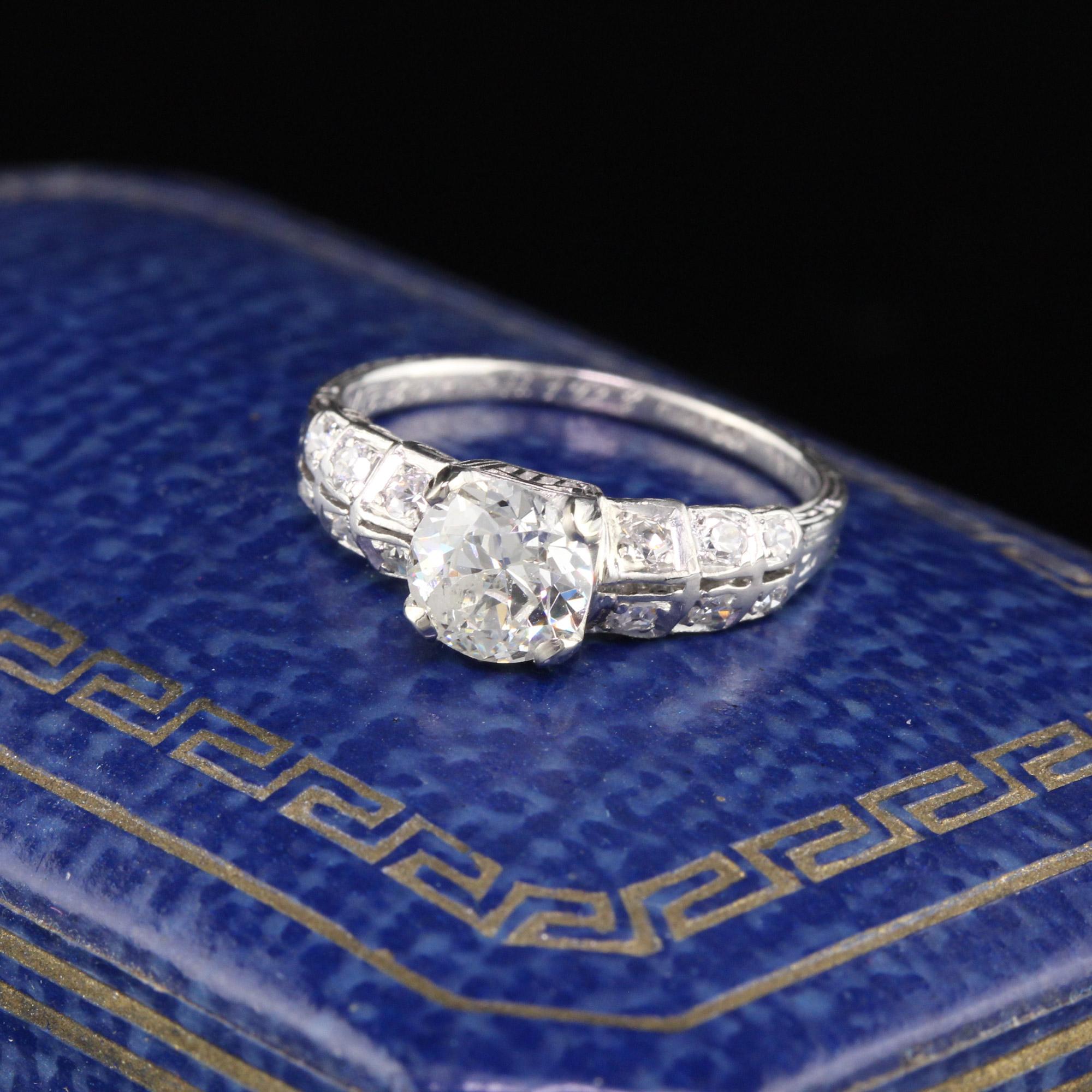 Stunning, simple, classic art deco engagement ring in platinum with a asscher cut diamond center, and 3 old cut round diamonds on either side of the shank.

#R0185

Metal: Platinum

Weight: 2.7 Grams

Center Diamond Weight: 0.77 ct old european cut
