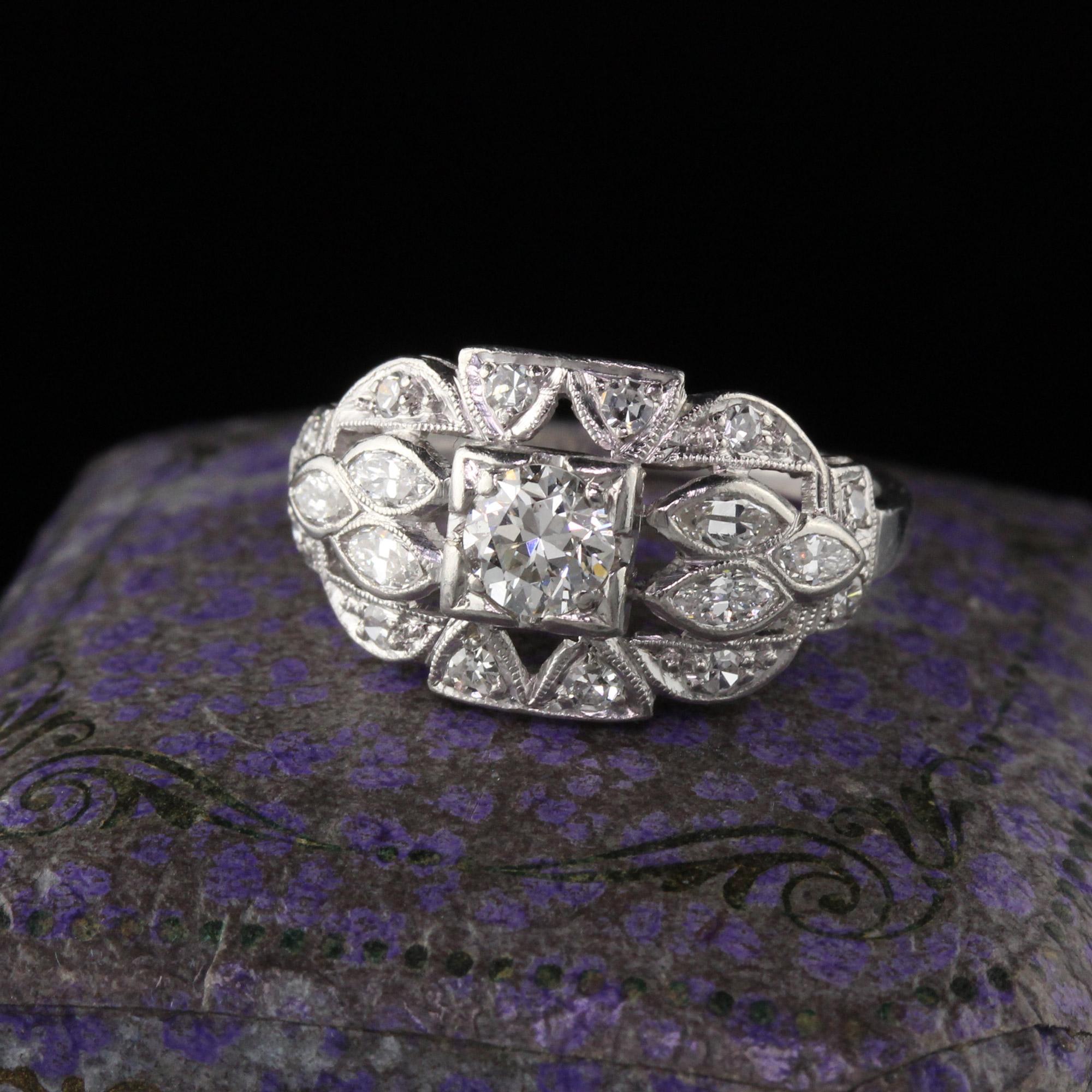 Stunning Art Deco engagement ring featuring an old european cut diamond in the center with old marquise and single cut diamonds. Beautiful geometric design typical to the era. Wraps beautifully around the finger.

#R0310

Metal: Platinum

Weight: