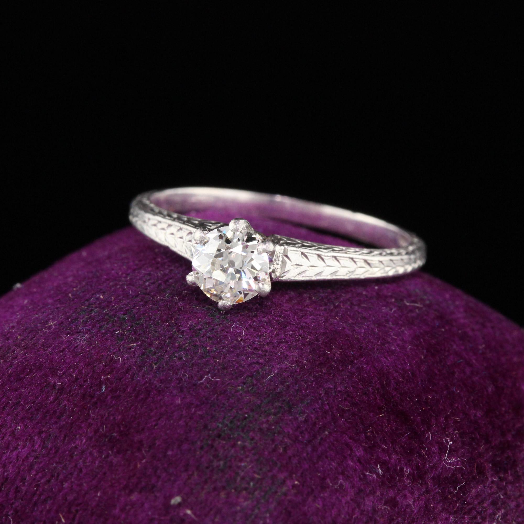 Gorgeous Art Deco solitaire engagement ring done in platinum with an old european cut diamond in the center. Crisp arrow engravings adorn the shank almost all the way around.

#R0288

Metal: Platinum

Weight: 3.1 Grams

Center Diamond Weight: 0.43