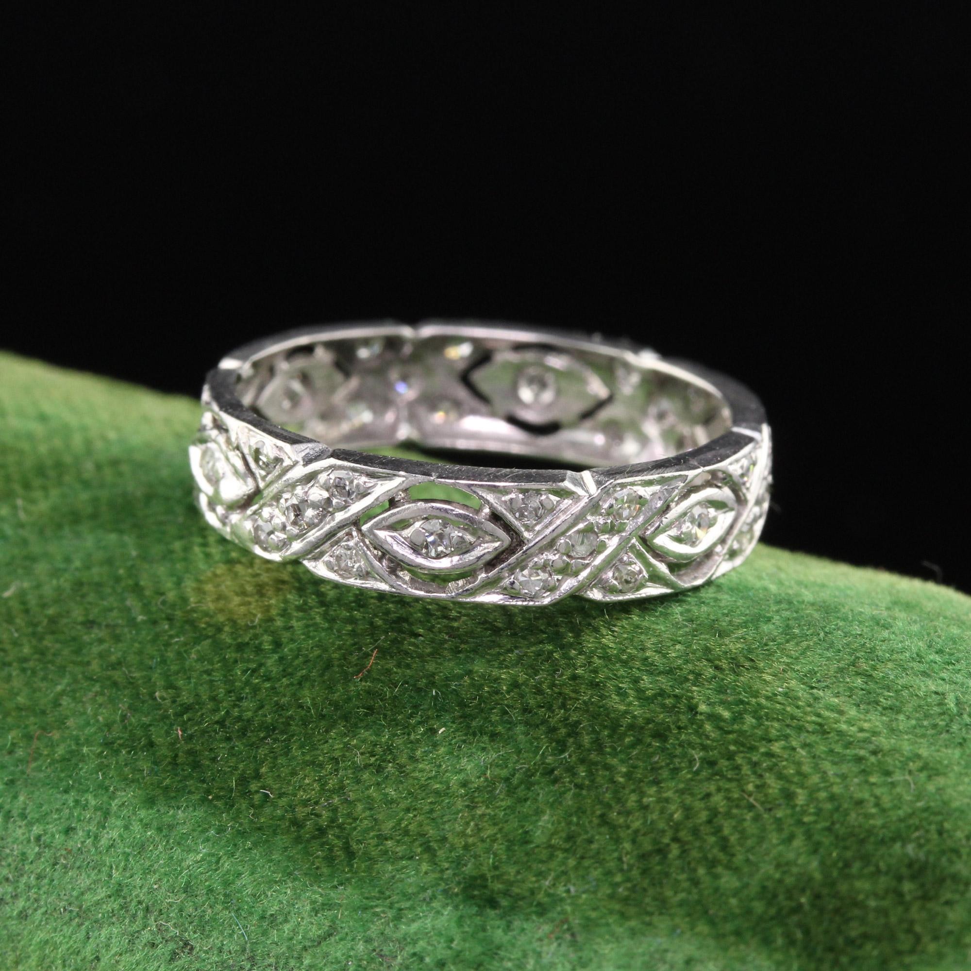 This is a gorgeous Art Deco Platinum Diamond Filigree Wedding Band. It is beautifully hand made and looks amazing on the finger. The design features alternating 'X' and marquise shapes.

#R0171

Metal: Platinum

Weight: 2.7 Grams

Total Diamond