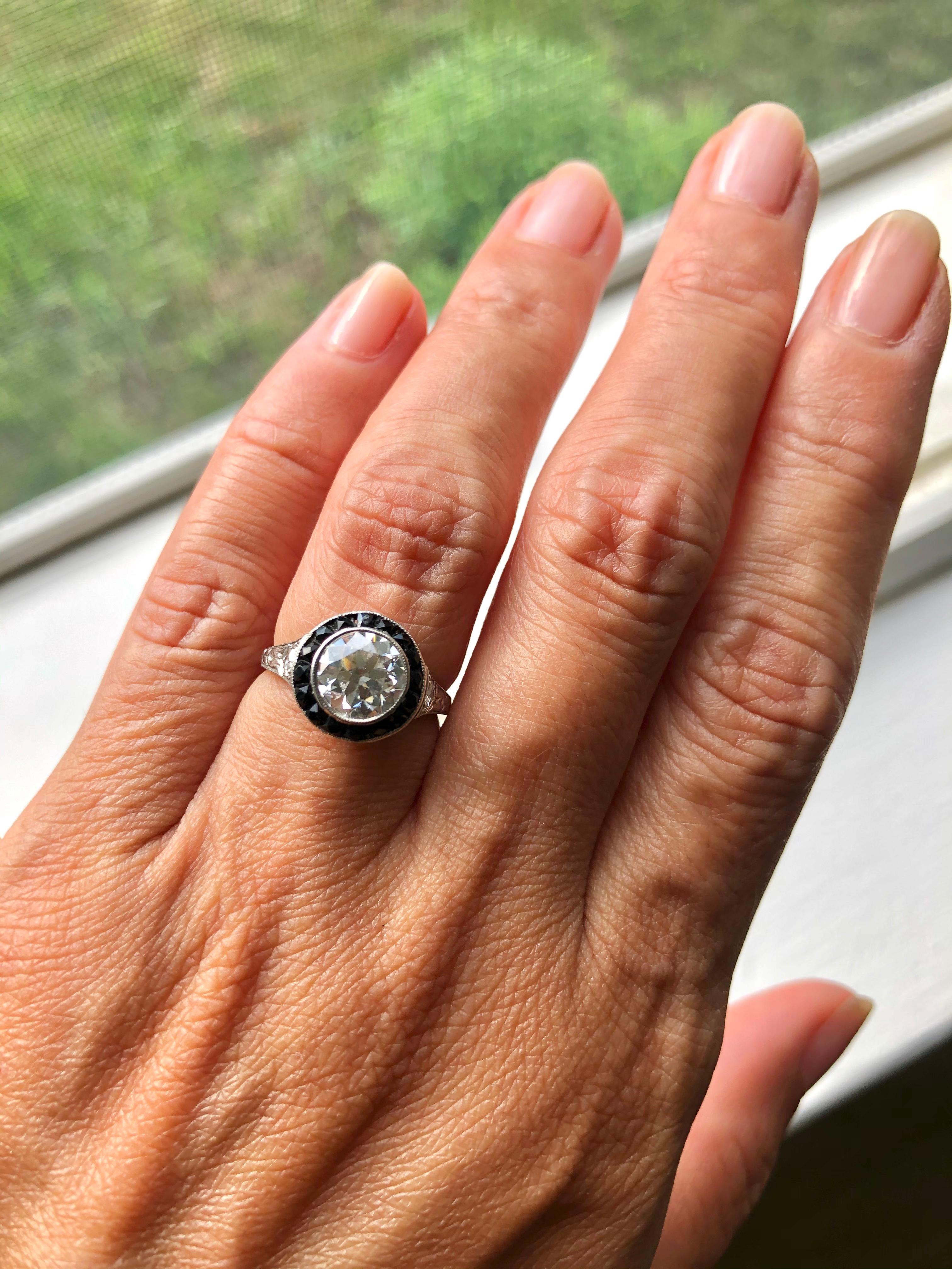 Women's or Men's Antique Art Deco Platinum Diamond Onyx Halo Ring