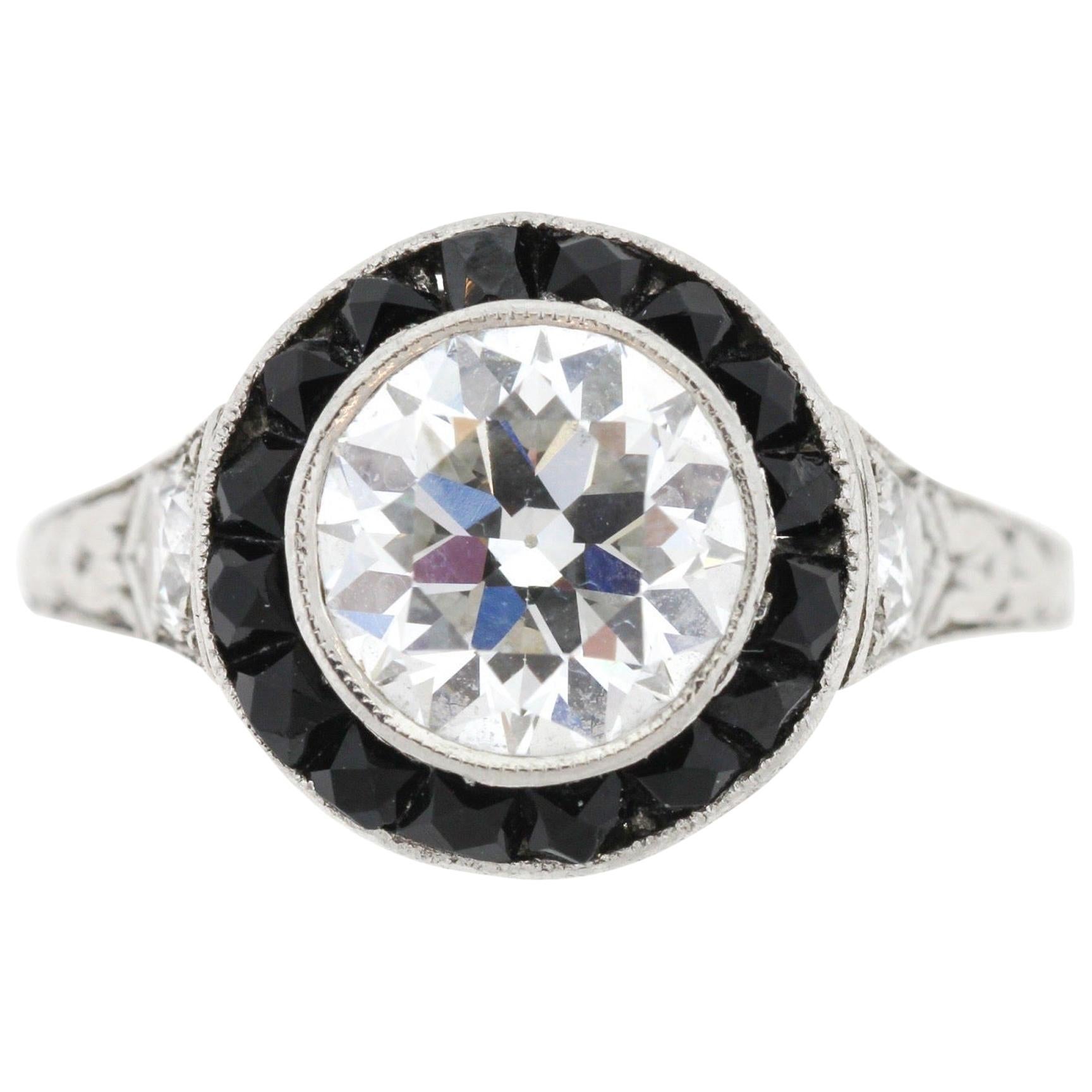 Antique Art Deco Platinum Diamond Onyx Halo Ring