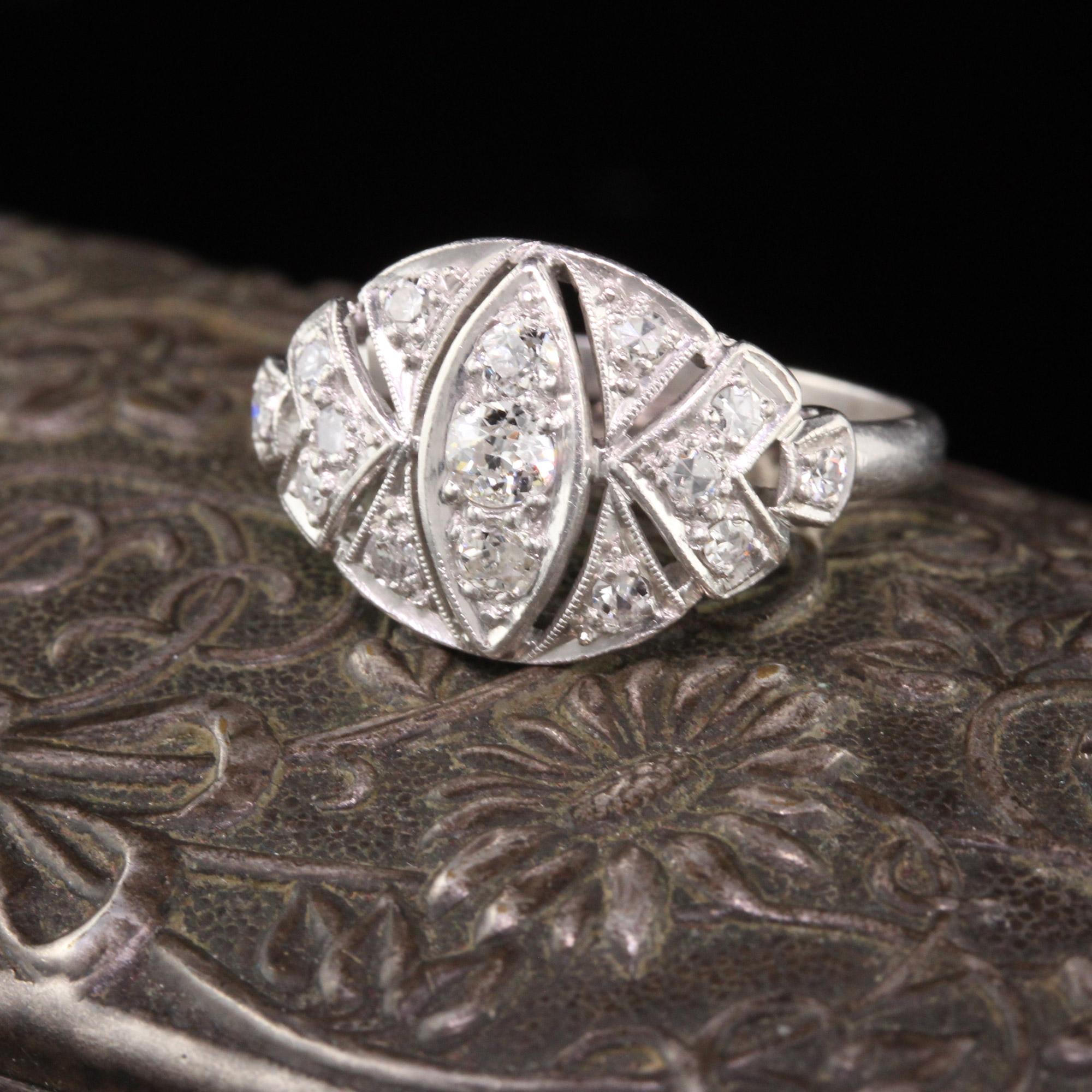 Beautiful Art Deco Platinum & Diamond Ring with a gorgeous design. Three round diamonds create the illusion of a marquise cut diamond in the center. Sits very low to the finger.

#R0290

Metal: Platinum

Weight: 3.9 Grams

Total Diamond Weight: 0.43