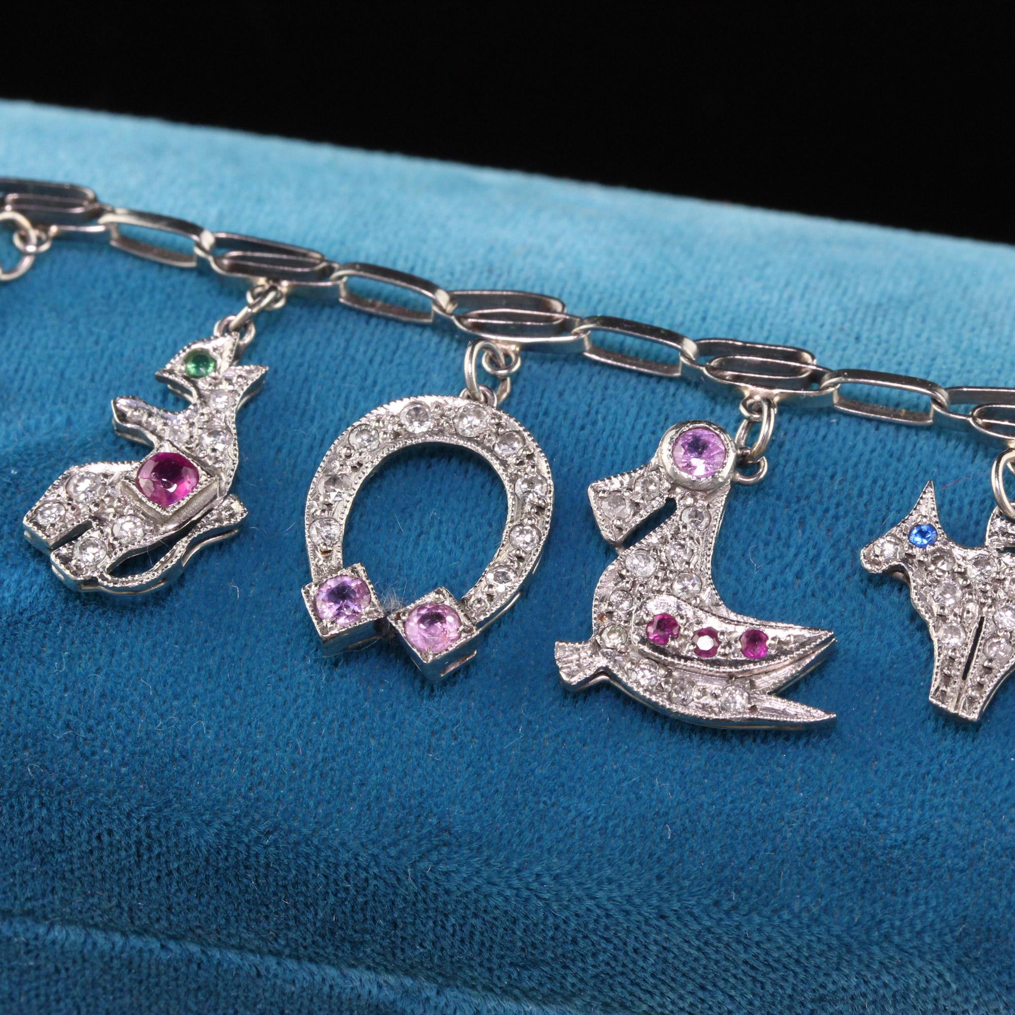 Women's Antique Art Deco Platinum Diamond Ruby Sapphire Charm Bracelet For Sale