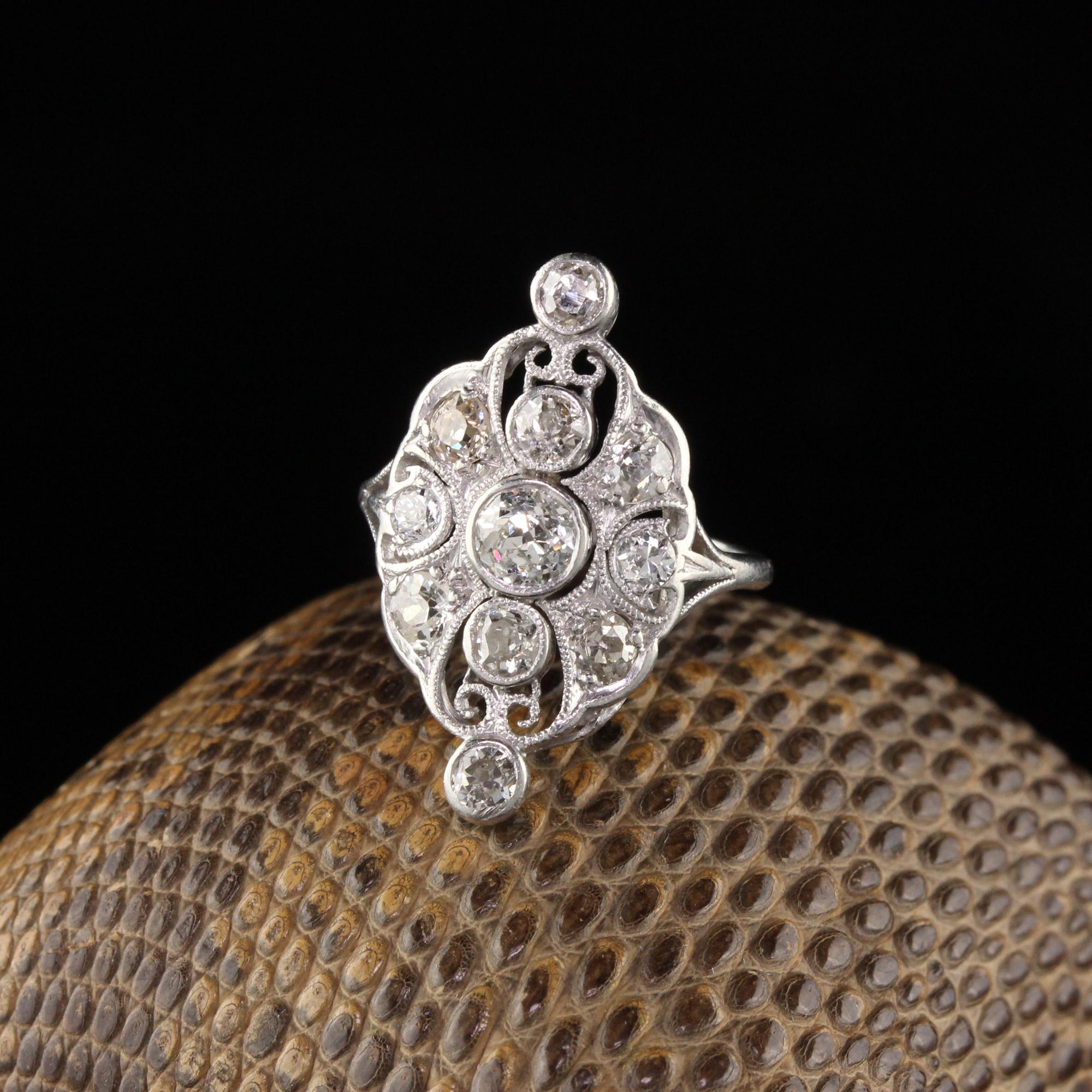 Stunning Art Deco shield ring with a total of 11 Diamonds.

Item #R0463

Metal: Platinum

Weight: 3.0 Grams

Total Diamond Weight: Approximately 0.75 cts

Diamond Color: L - H

Diamond Clarity: VS2 - SI1

Ring Size: 3

This ring can be sized for a