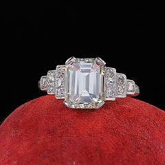 Antique Art Deco Platinum Emerald Cut Diamond Engraved Engagement Ring - GIA