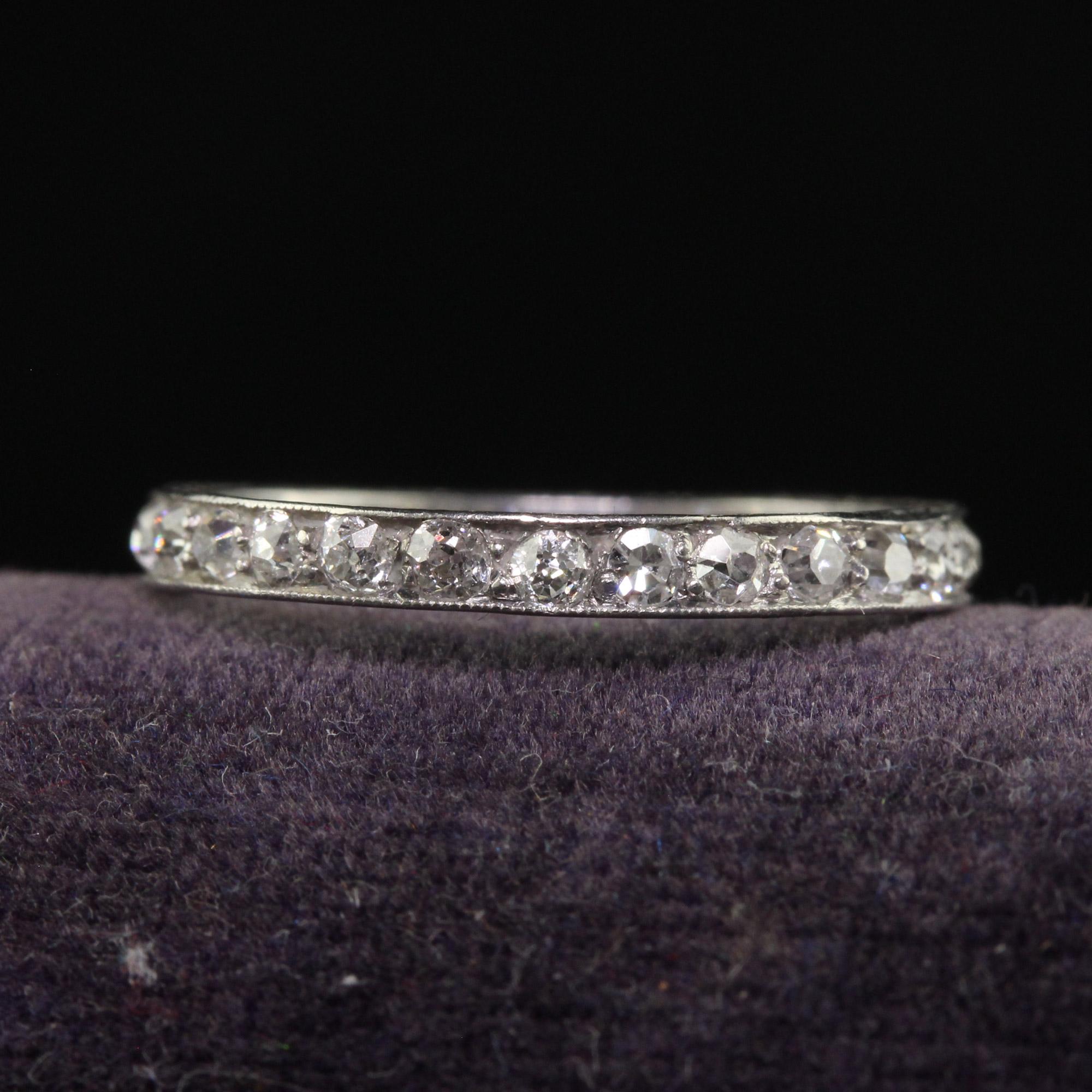 Beautiful Antique Art Deco Platinum Engraved Old Mine Diamond Eternity Band - Size 5 1/4. This gorgeous Art Deco eternity band is crafted in platinum. The ring features old mine cut diamonds going around the entire band with engravings on the sides
