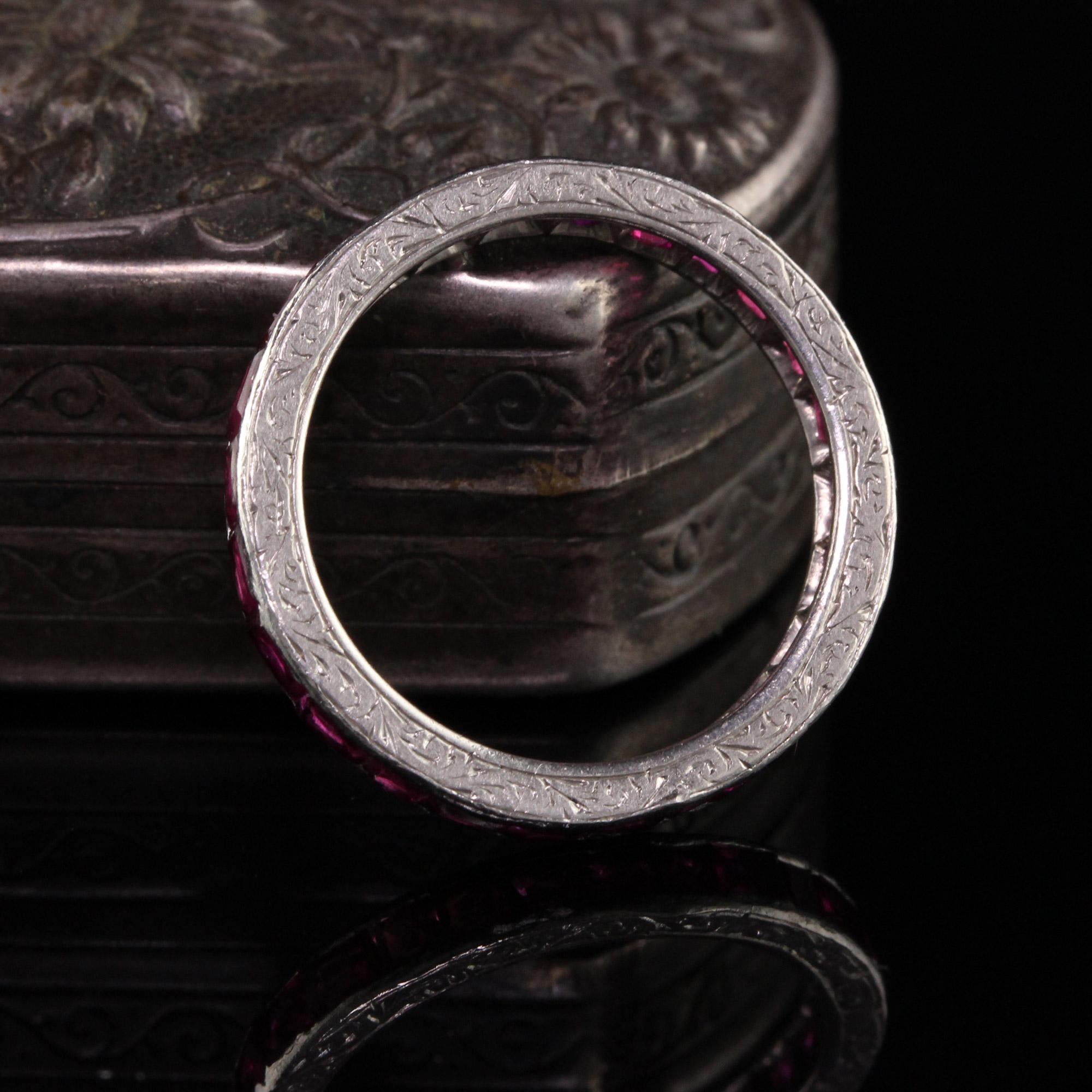 Beautiful Antique Art Deco Platinum Engraved Ruby Eternity Band - Size 6 1/2. This is a beautifully engraved platinum band that features nice red rubies going around the entire band. Some of the rubies have minor abrasions and chips but nothing that
