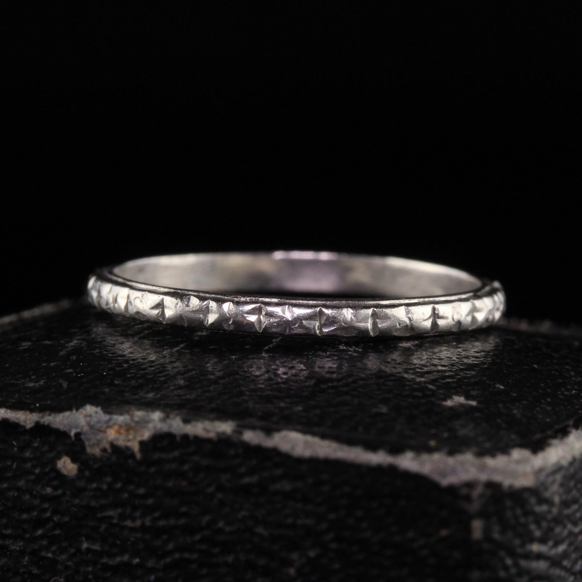 Beautiful Antique Art Deco Platinum Engraved Wedding Band - Size 5. This beautiful wedding band is crafted in platinum. The ring has deep engravings going around the entire ring and is in good condition. This ring can be worn by itself or even