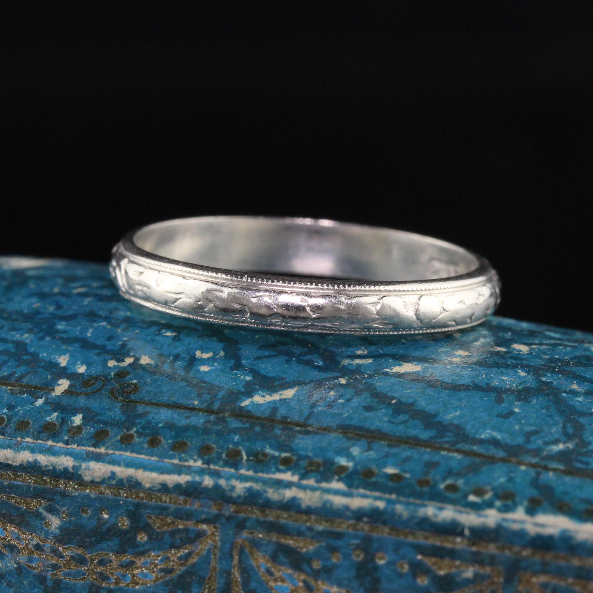 Beautiful Antique Art Deco Platinum Engraved Wedding Band - Size 8 1/4. This gorgeous wedding band is crafted in platinum and has engravings going around the entire ring.

Item #R1263

Metal: Platinum

Weight: 4 Grams

Size: 8 1/4

Measurements: Top