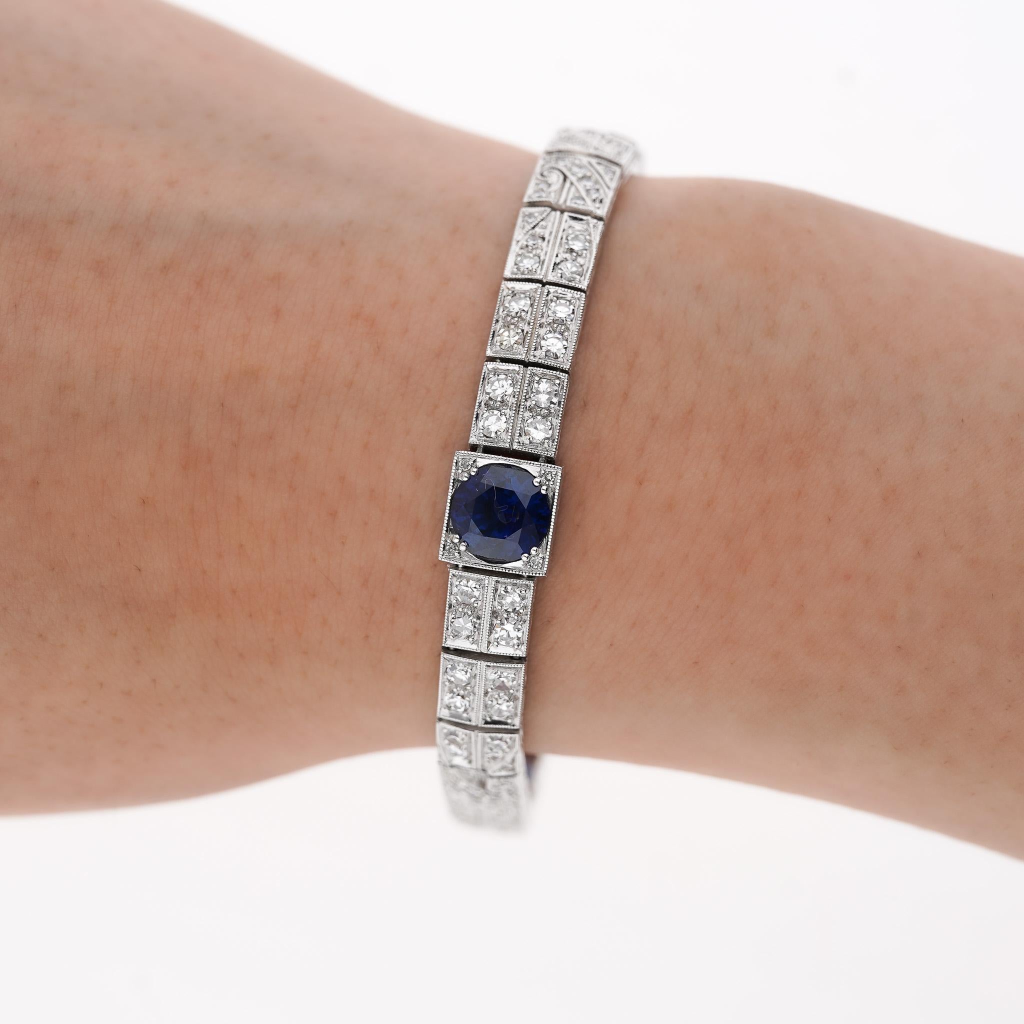 Hermann Marcus Signed Antique Art Deco Blue Sapphire and Diamond Bracelet in Platinum.  

Featuring 3 round cut blue sapphires and 118 round cut diamonds, made with a stunning and superbly detailed filigree setting on platinum. A quintessentially