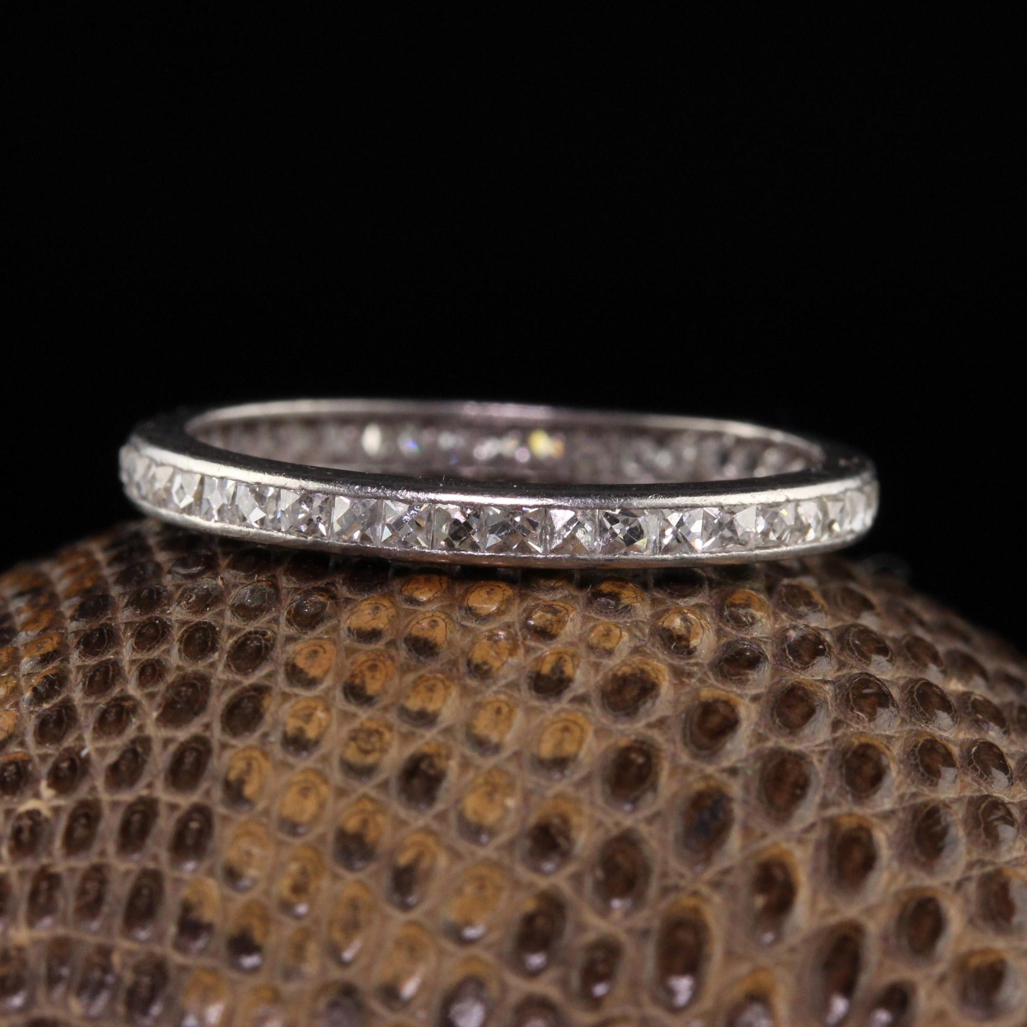 Beautiful Antique Art Deco Platinum French Cut Diamond Eternity Band - Size 5. This gorgeous eternity band is crafted in platinum. There are french cut diamonds going around the entire band with two of the stones replaced with antique carre cut